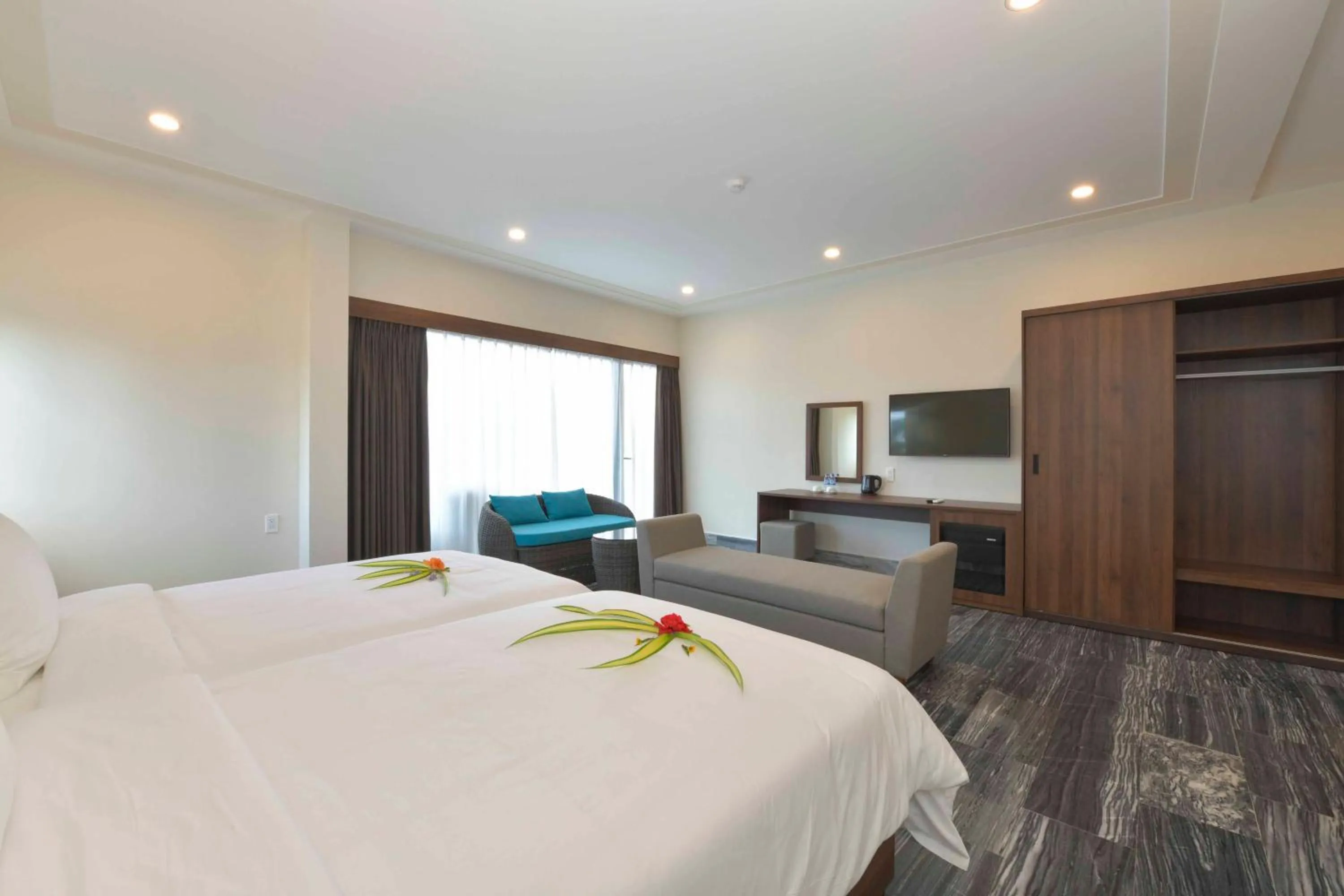 Bed in CocoLand Thu Xa Ancient Town Resort