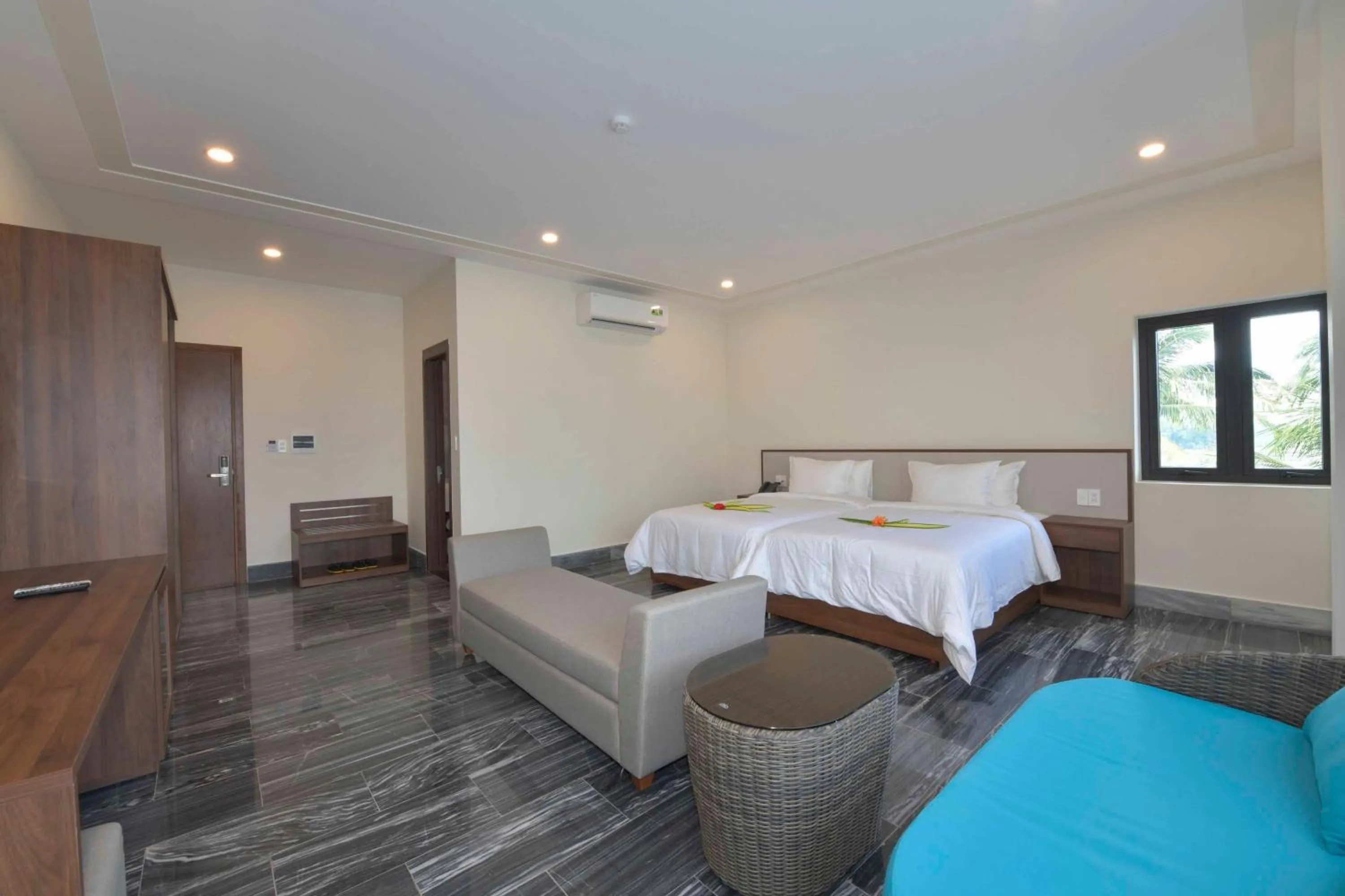 Bed in CocoLand Thu Xa Ancient Town Resort