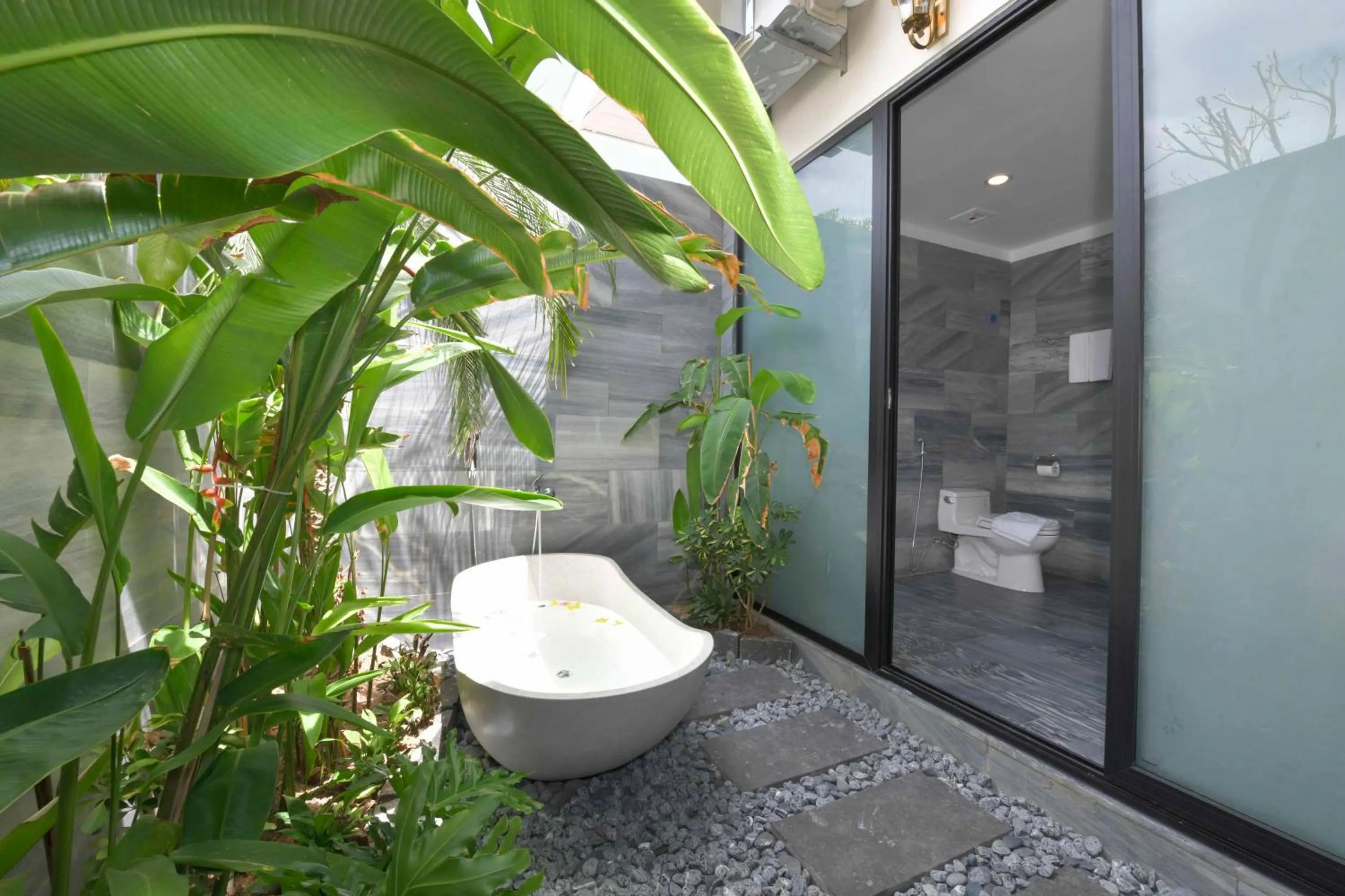 Shower in CocoLand Thu Xa Ancient Town Resort