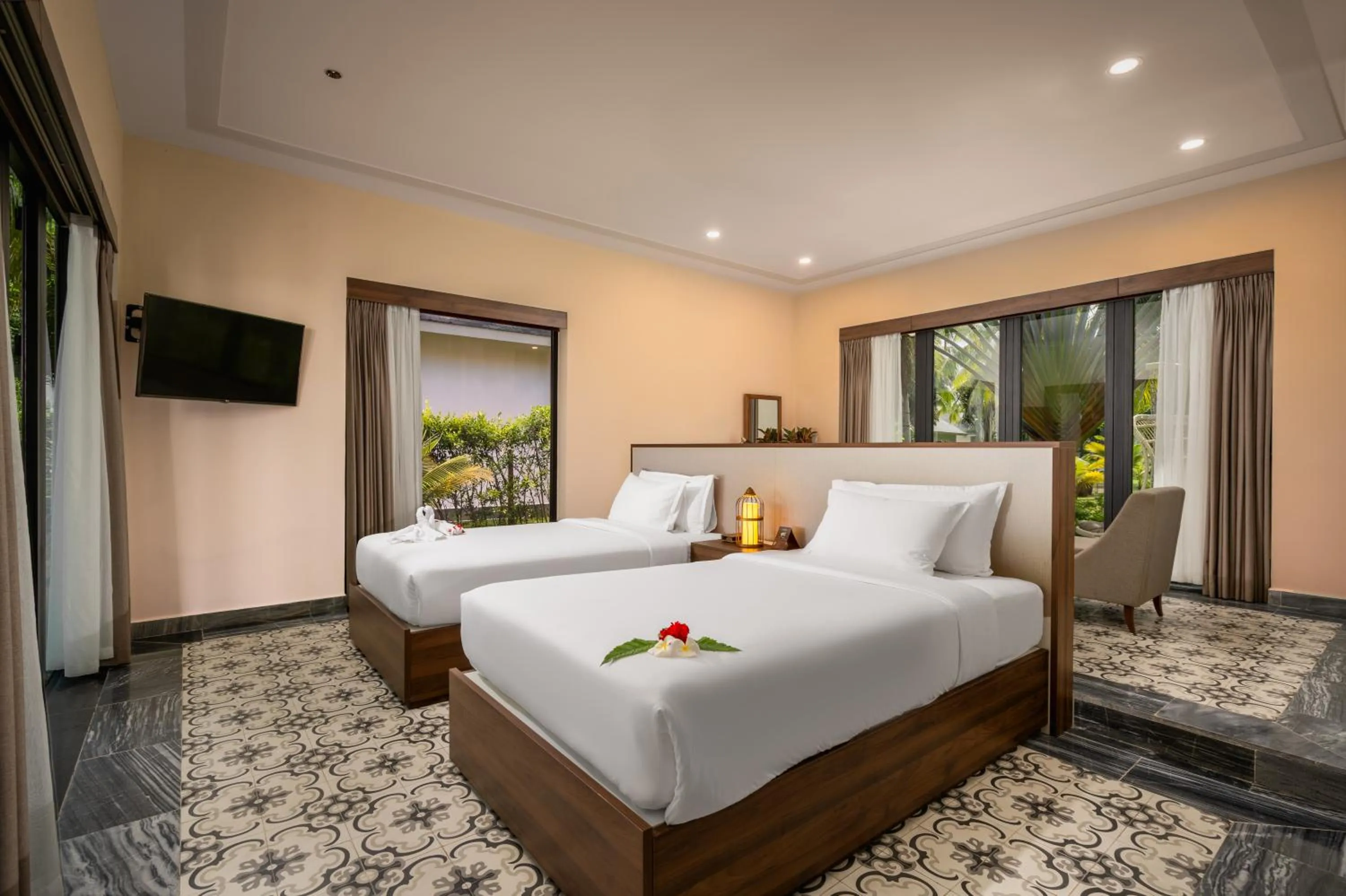 Photo of the whole room, Bed in CocoLand Thu Xa Ancient Town Hotel & Resort