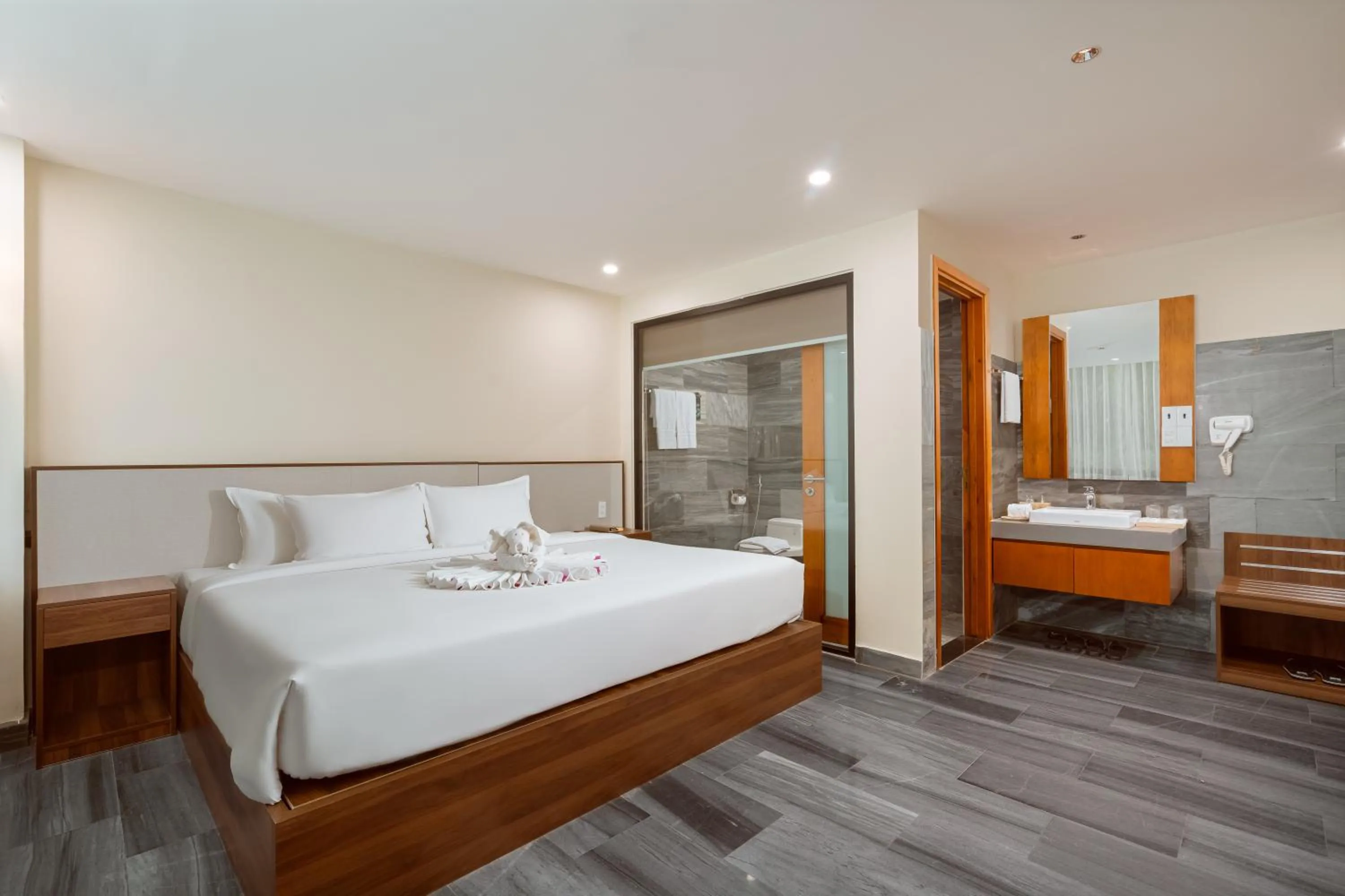 Photo of the whole room, Bed in CocoLand Thu Xa Ancient Town Hotel & Resort