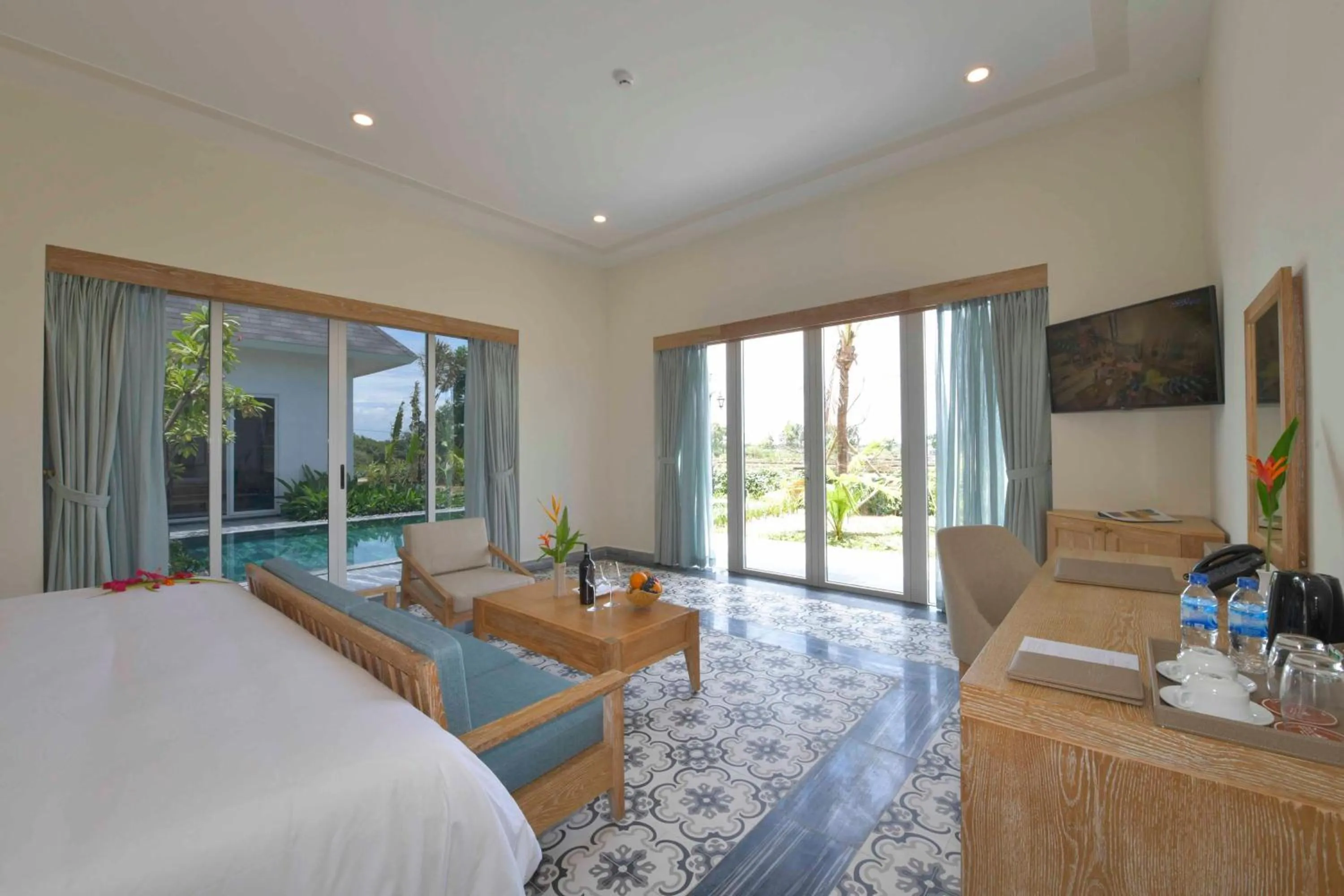 Patio, Bed in CocoLand Thu Xa Ancient Town Resort