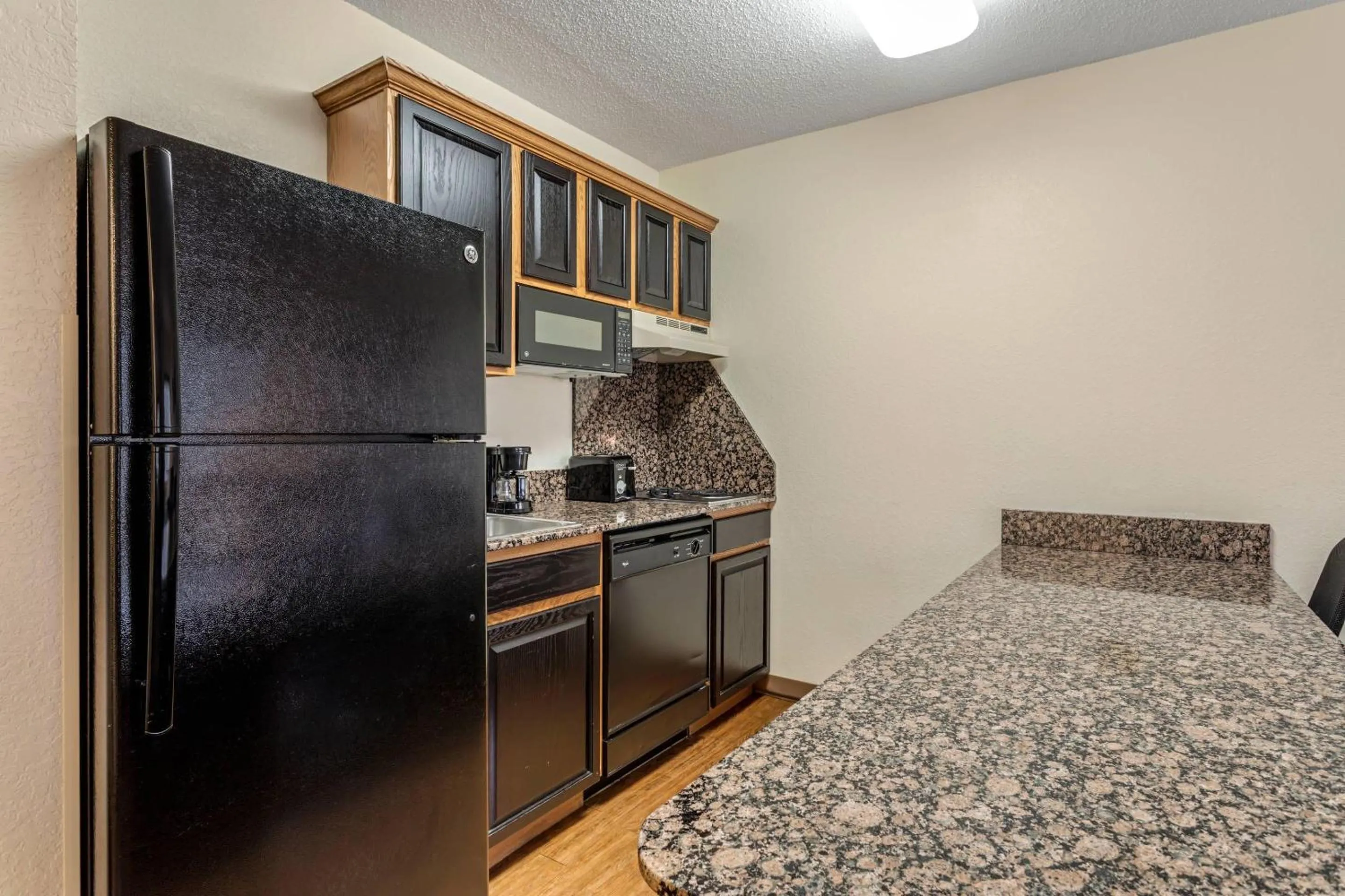 Bedroom, Bed in LeConte Hotel & Convention Center, an Ascend Collection Hotel