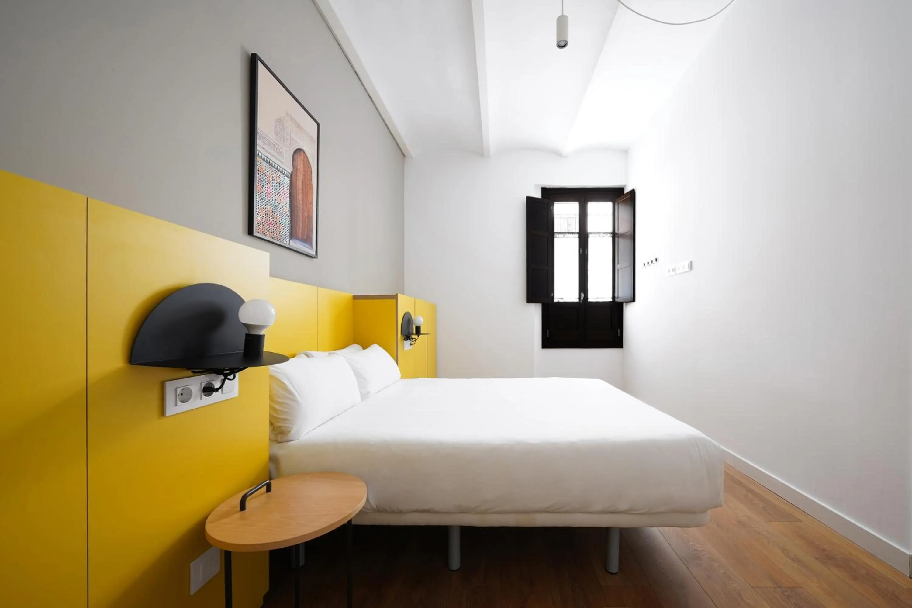 Bed in Numa Granada Vega