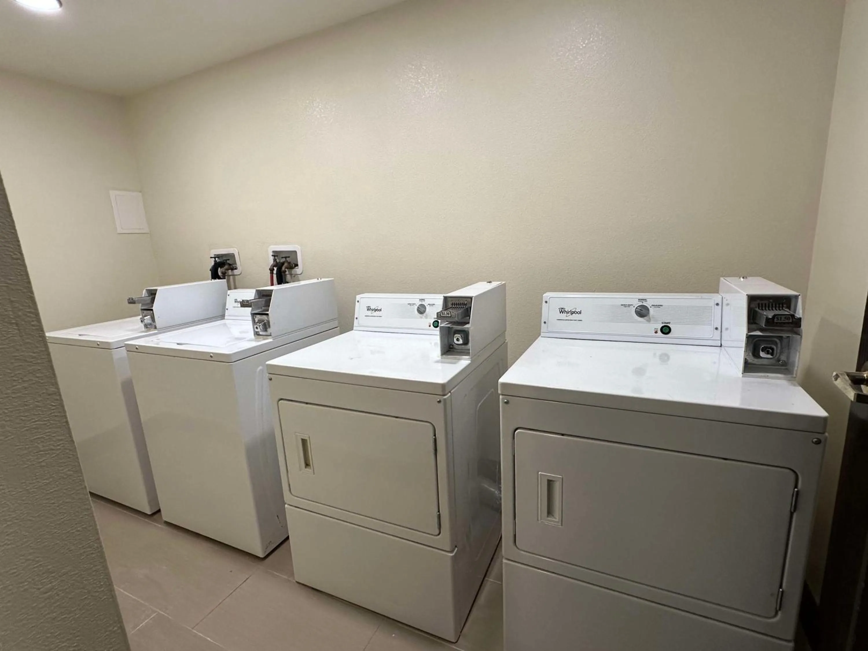 laundry in Vista Suites Near Island and Leconte Convention Center