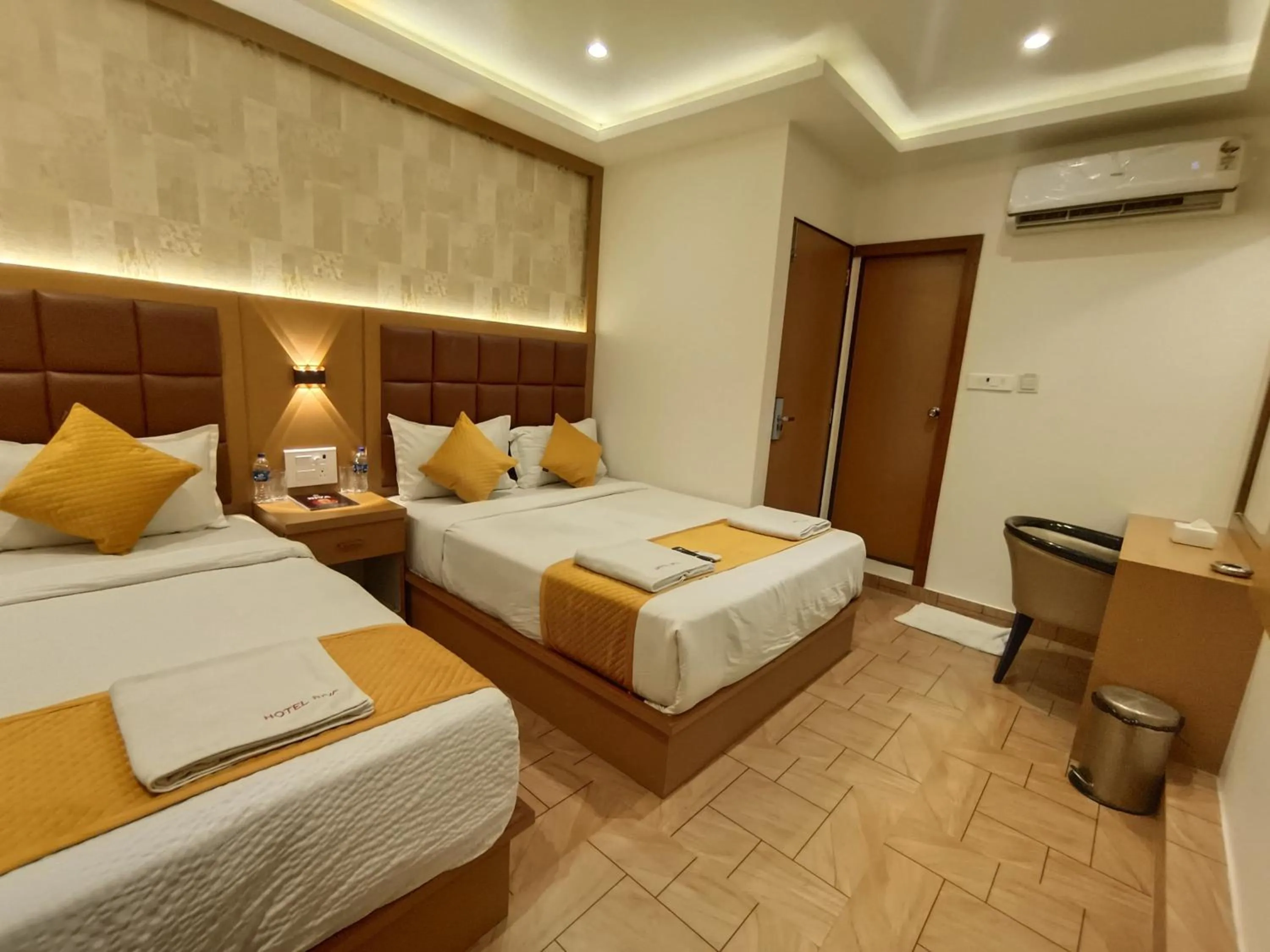 Bed in Hotel Riva International Goregaon- Near NESCO