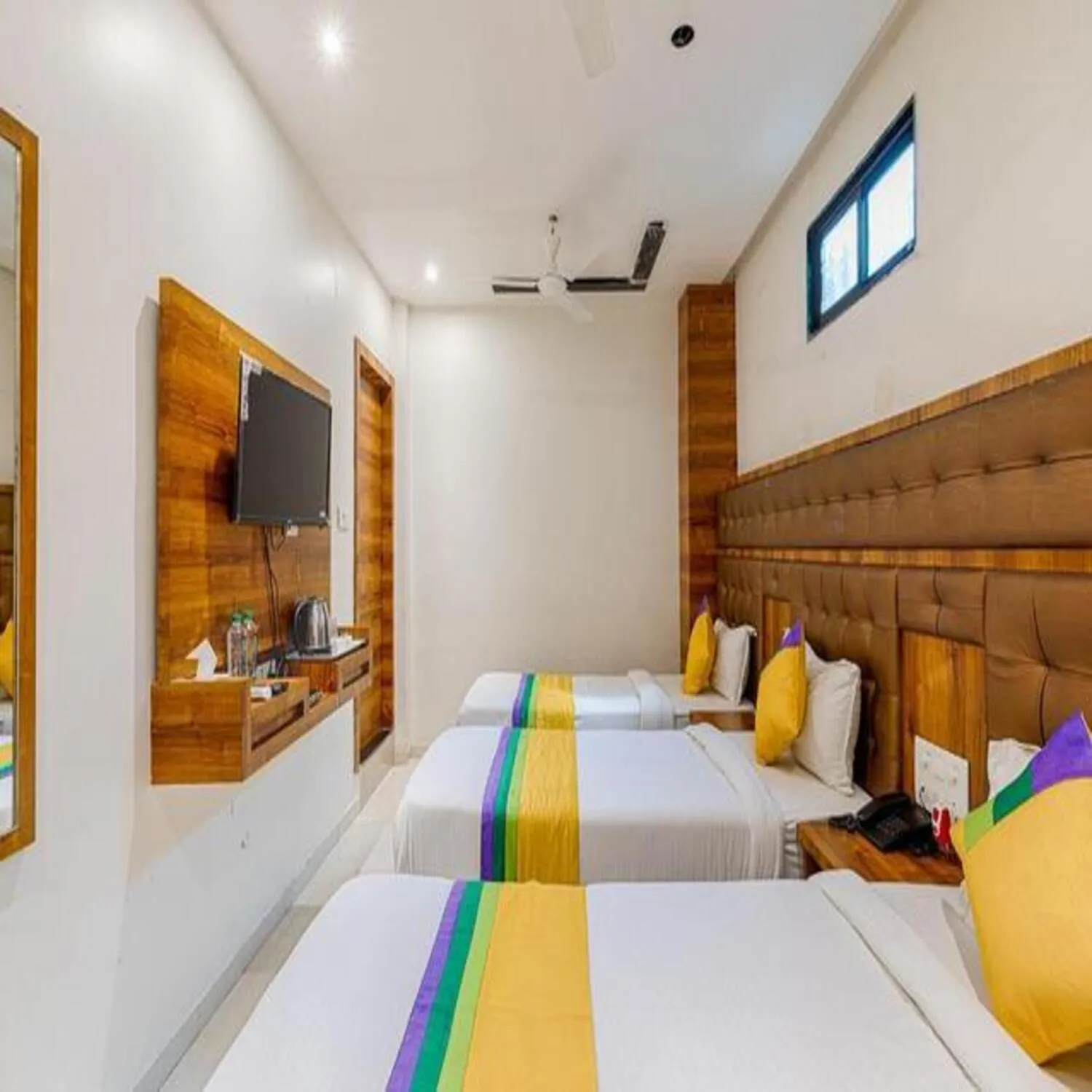 Bed in Hotel Riva International Goregaon- Near NESCO