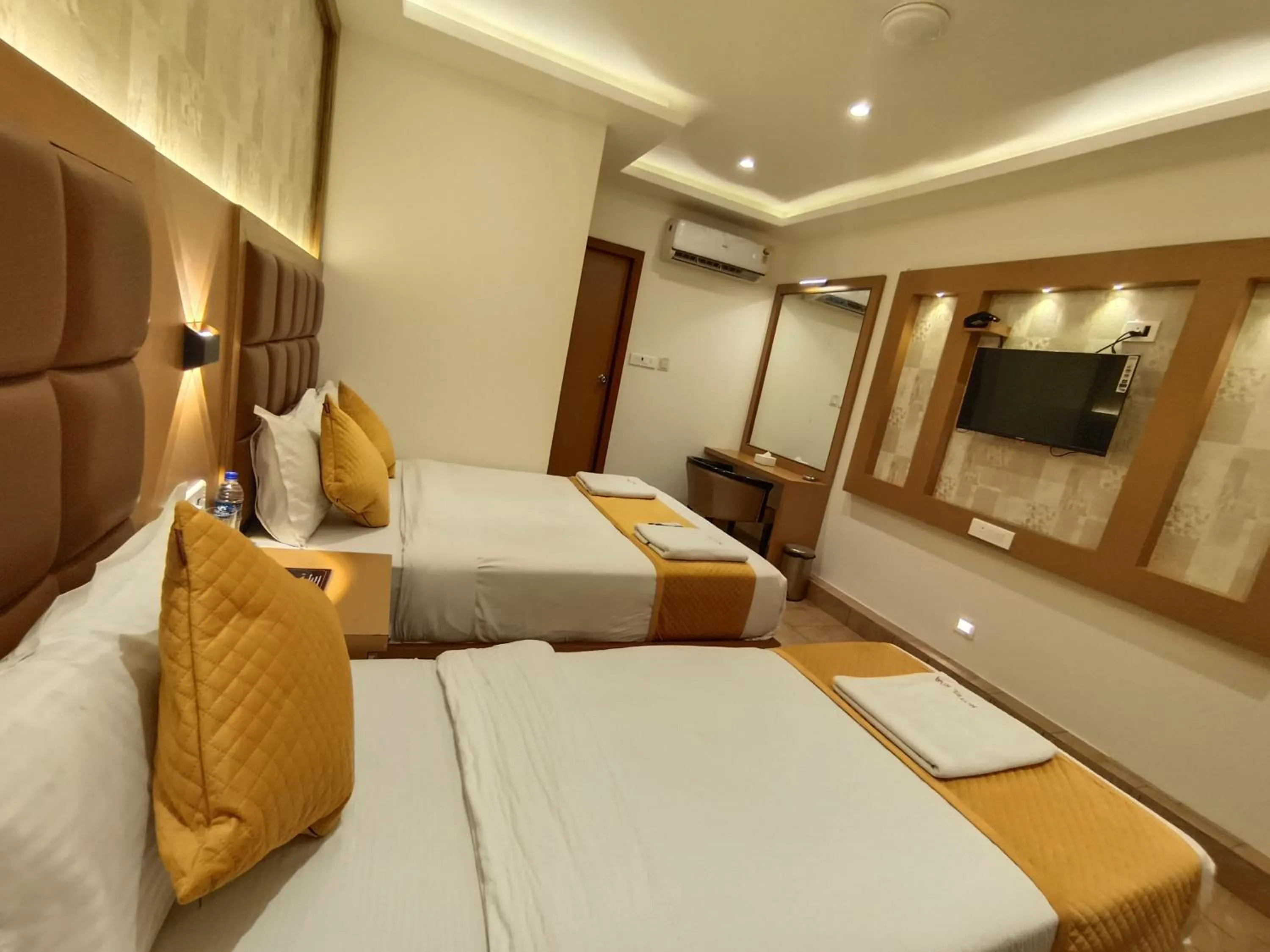 Bed in Hotel Riva International Goregaon- Near NESCO