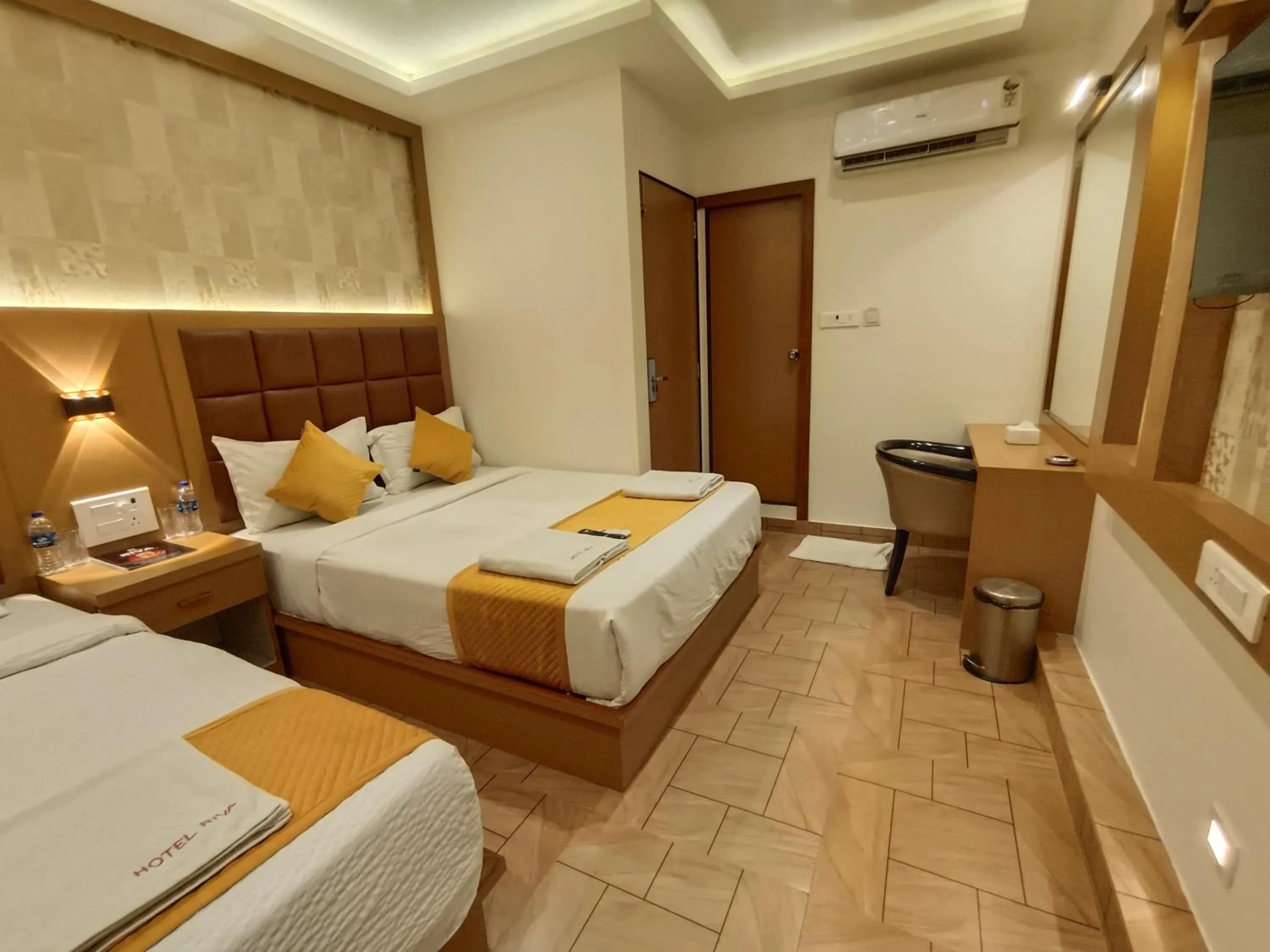 Bed in Hotel Riva International Goregaon- Near NESCO