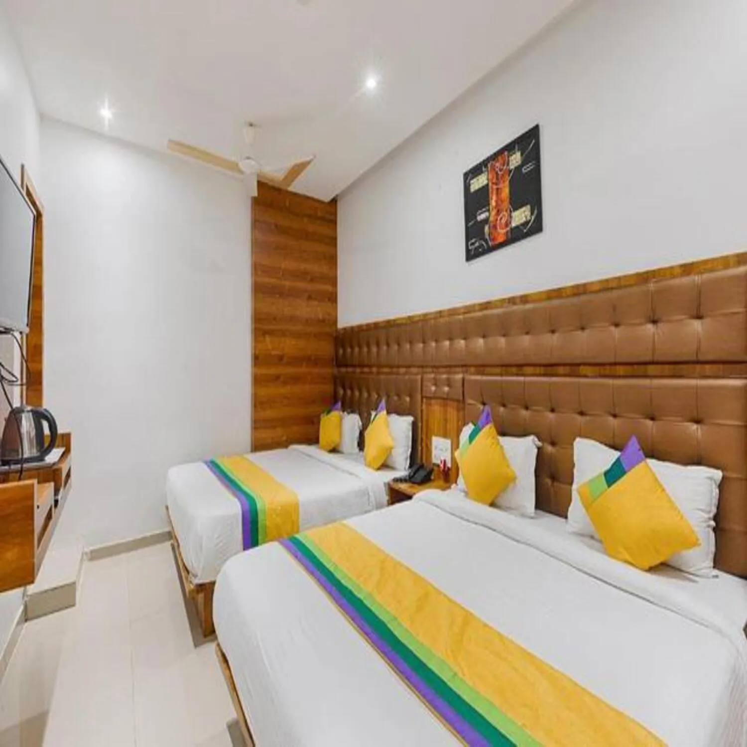 Bed in Hotel Riva International Goregaon- Near NESCO