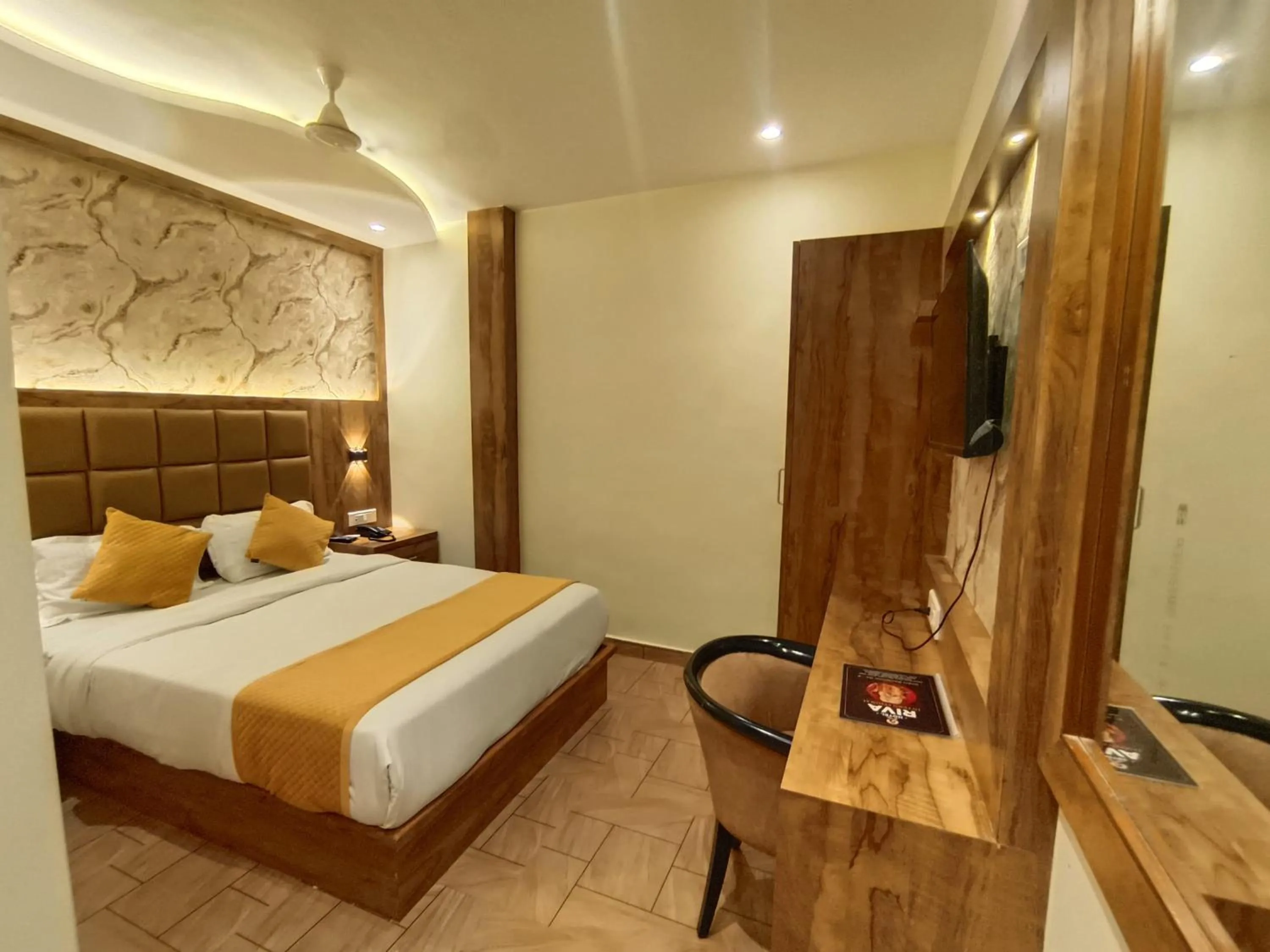 Bed in Hotel Riva International Goregaon- Near NESCO