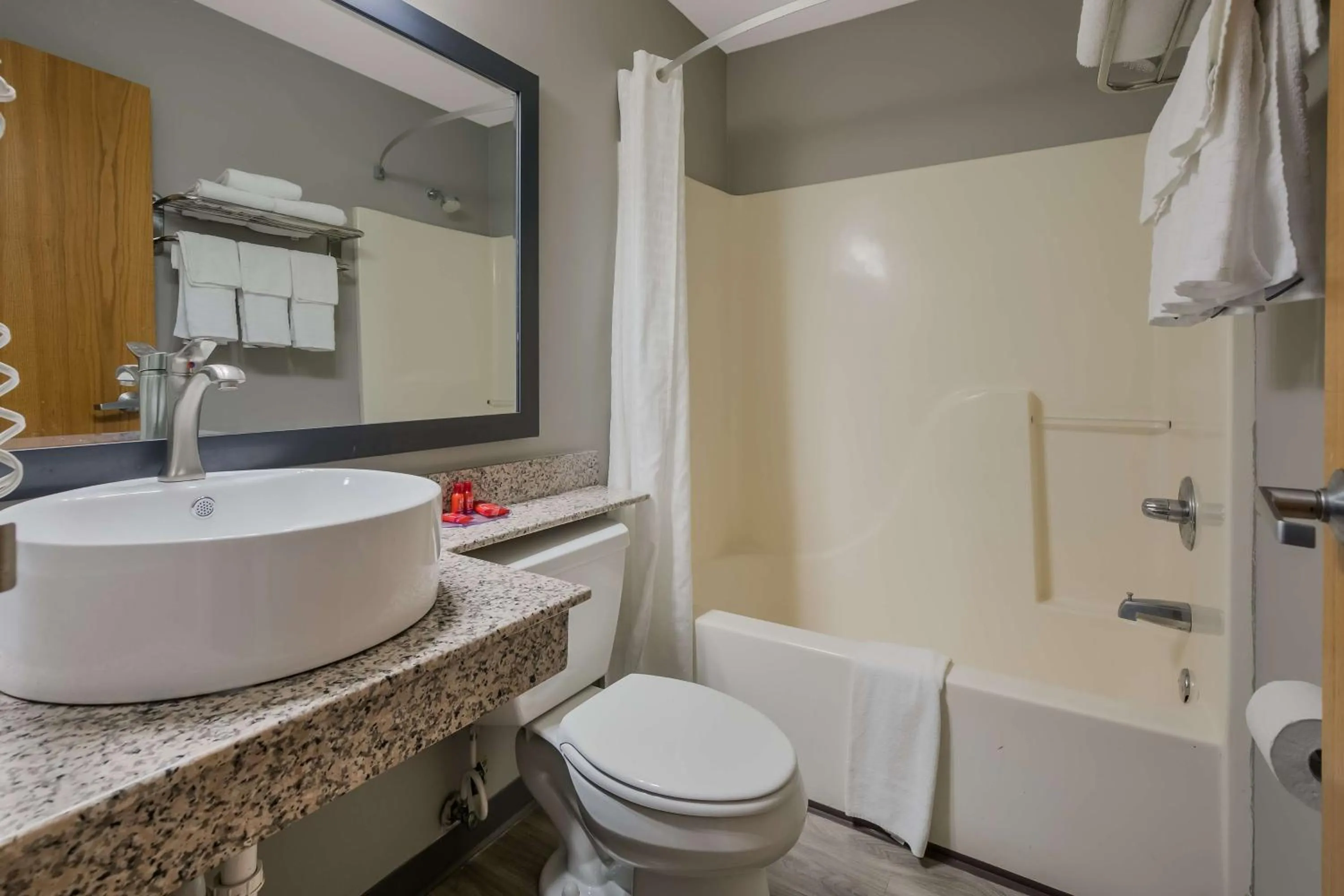 Bathroom in SureStay Plus Hotel by Best Western Sevierville