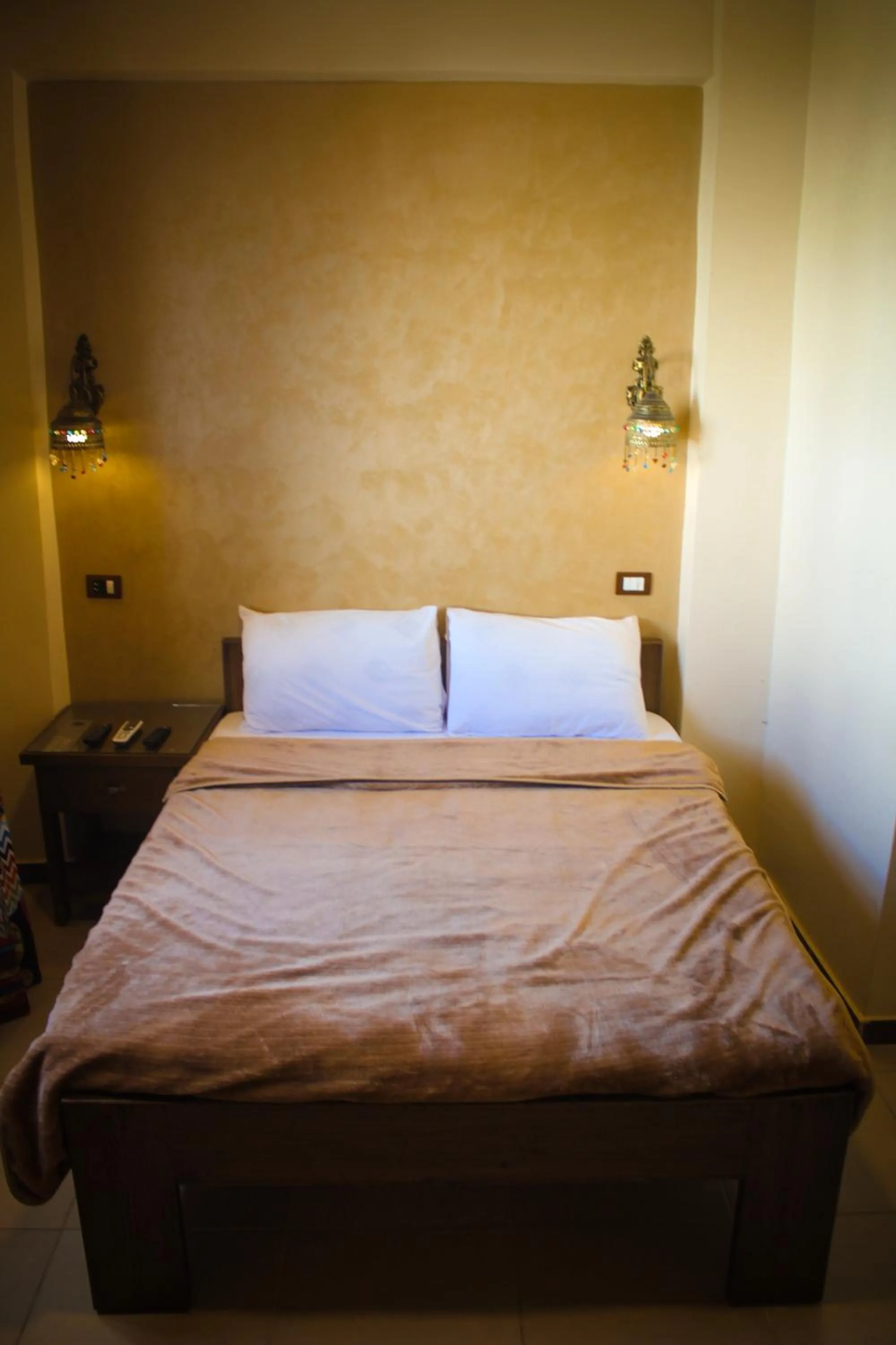 Bed in Dahab Holiday Hotel