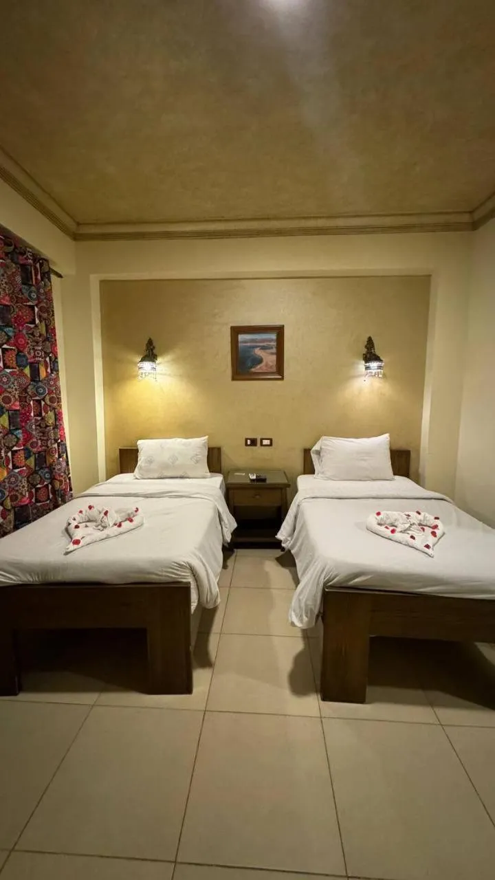 Bed in Dahab Holiday Hotel