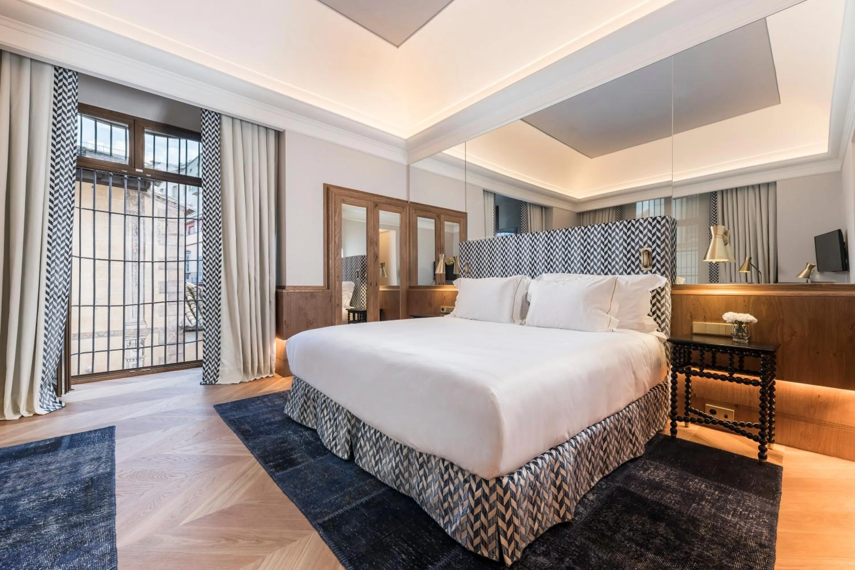 Bed in Palacio Solecio, a Small Luxury Hotel of the World