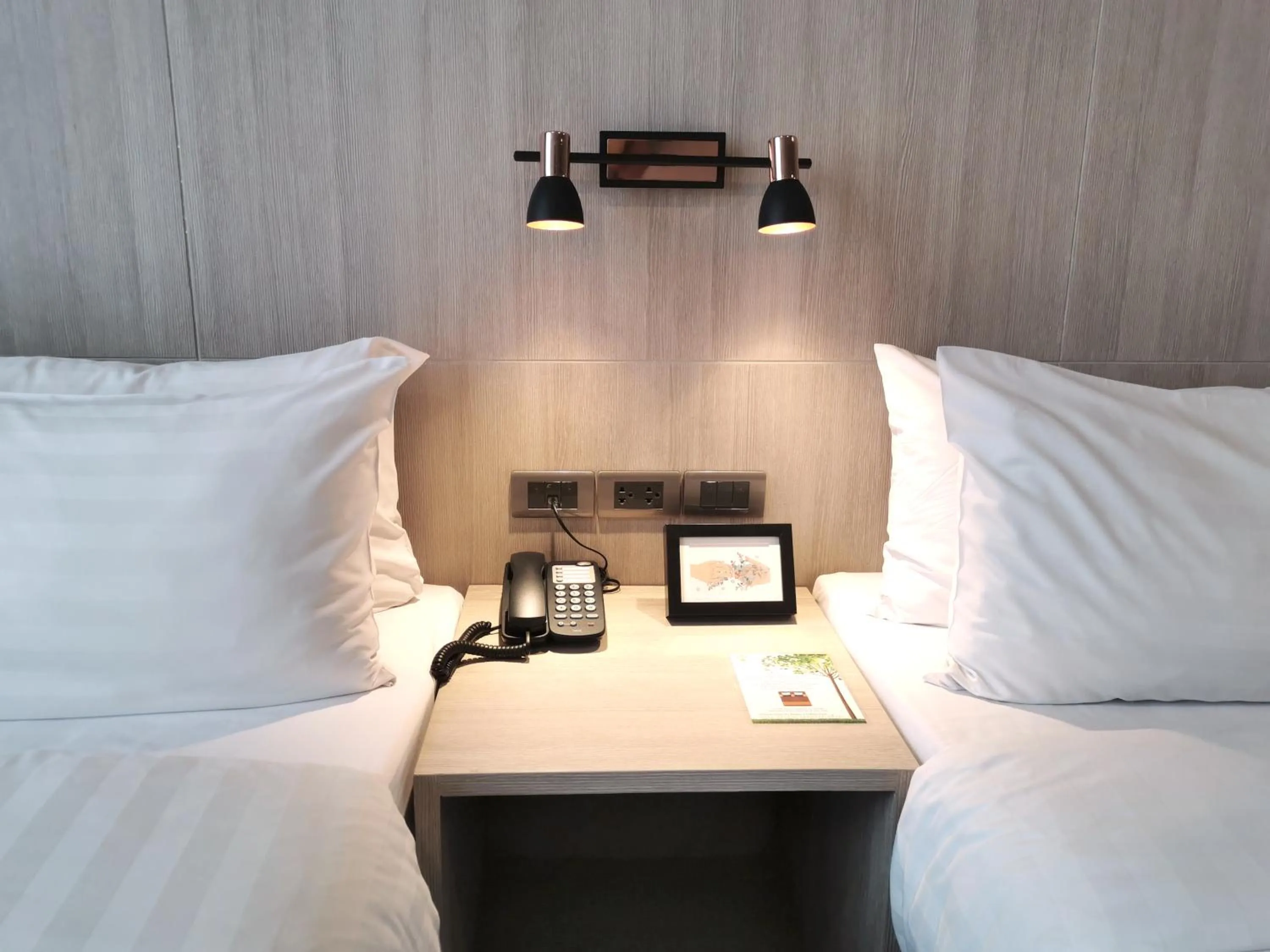 Bed in Gold Orchid Bangkok Hotel