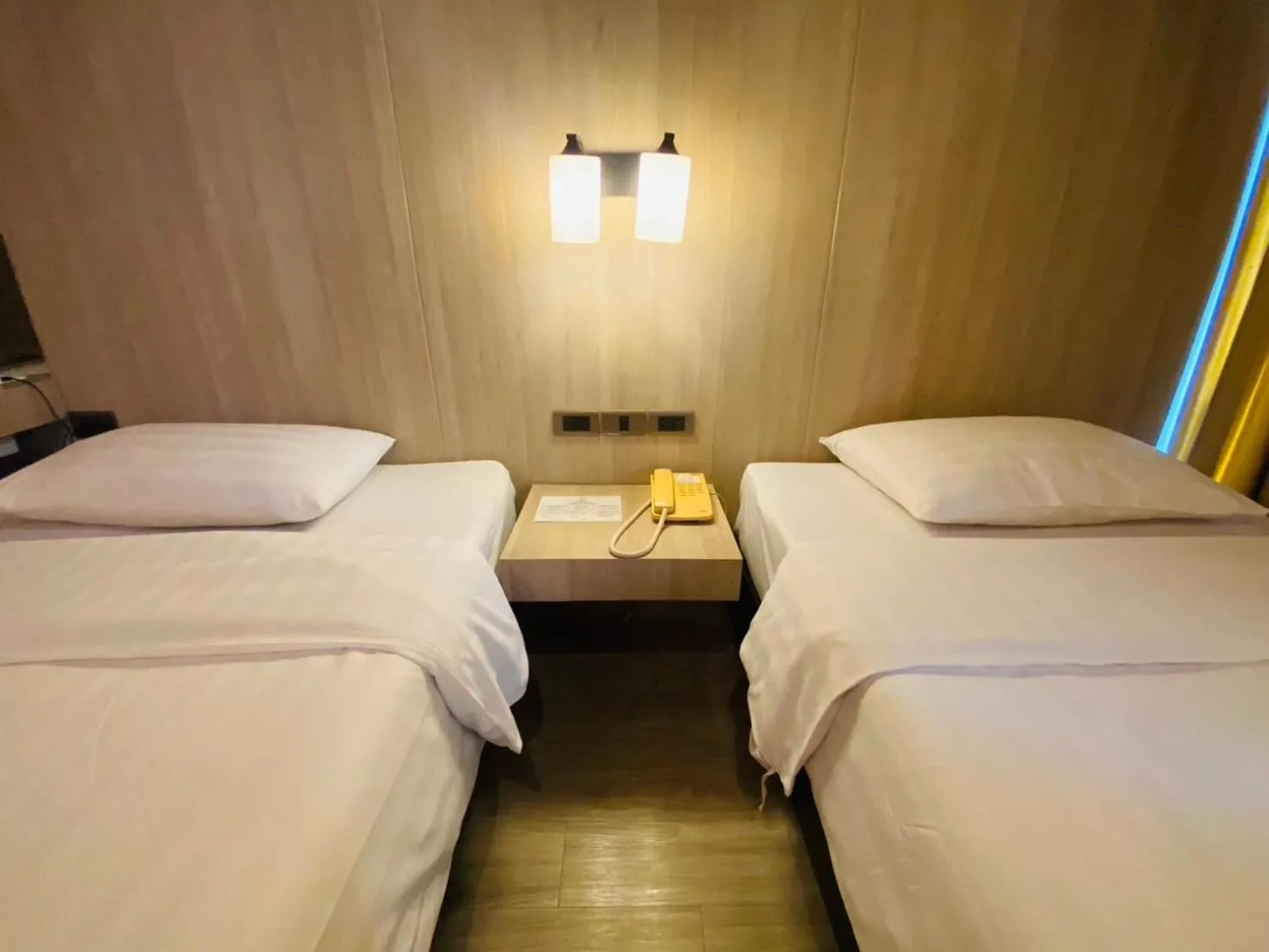 Bed in Gold Orchid Bangkok Hotel