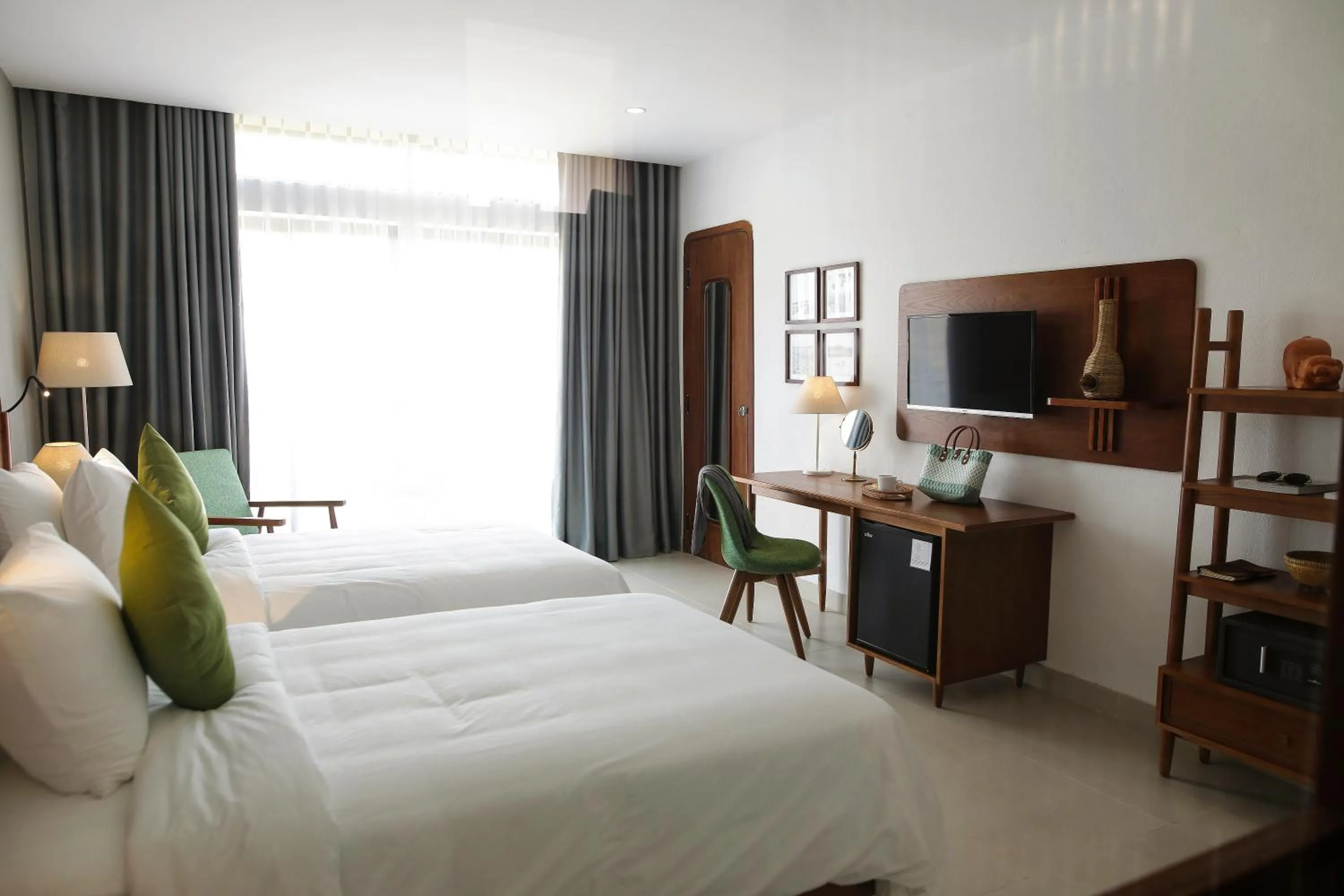 Communal lounge/ TV room, Bed in Hoian Tranquil Lodge - Chon Binh Yen