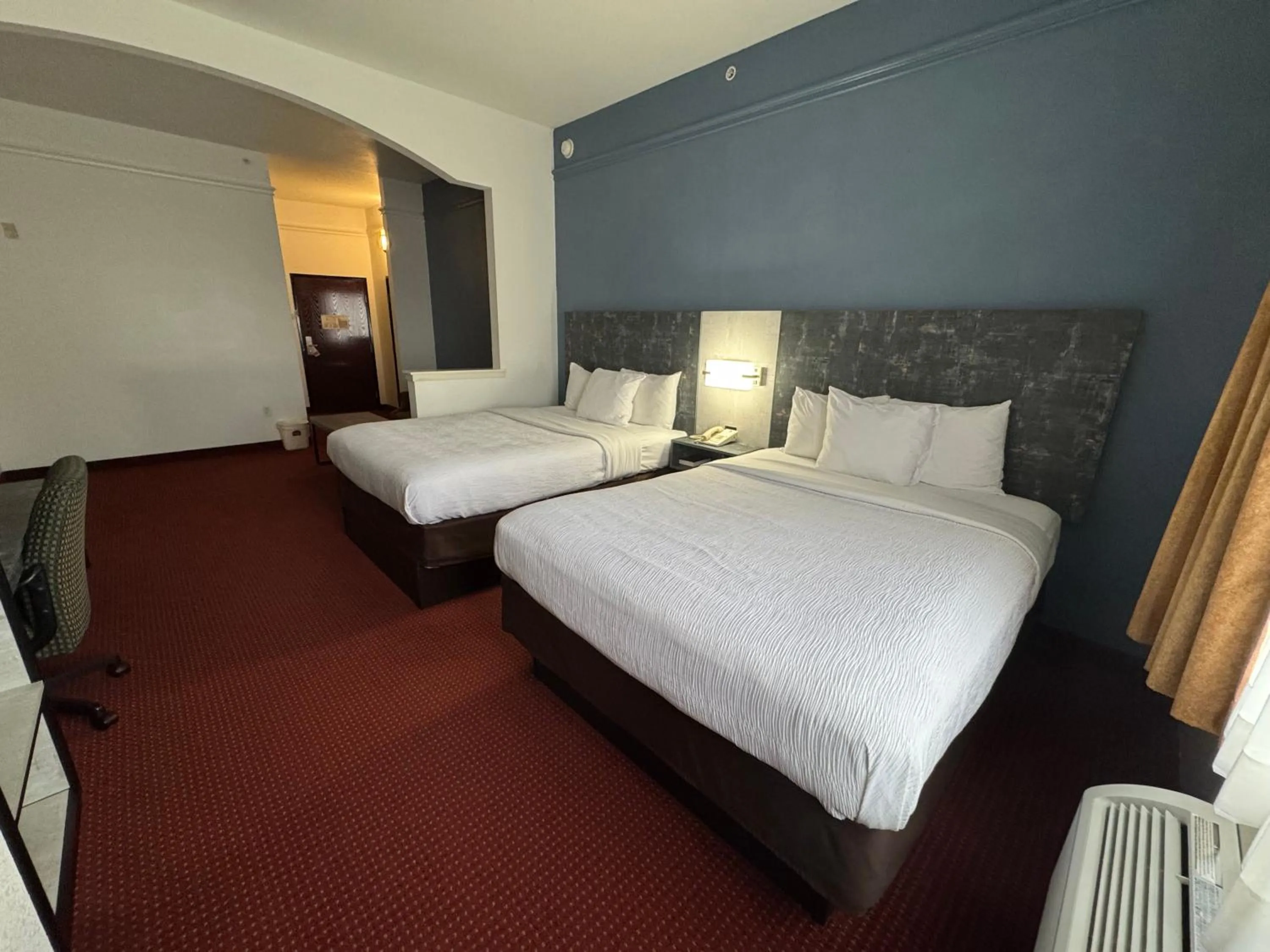 Bed in FairBridge Inn & Suites Cleburne