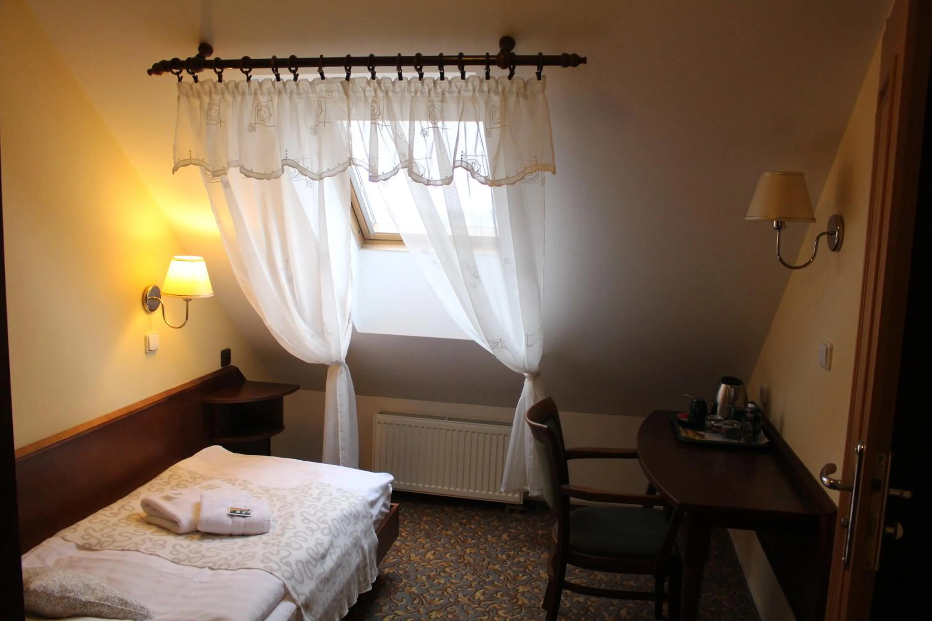 Bed in Zámecký Hotel Zlatý Orel