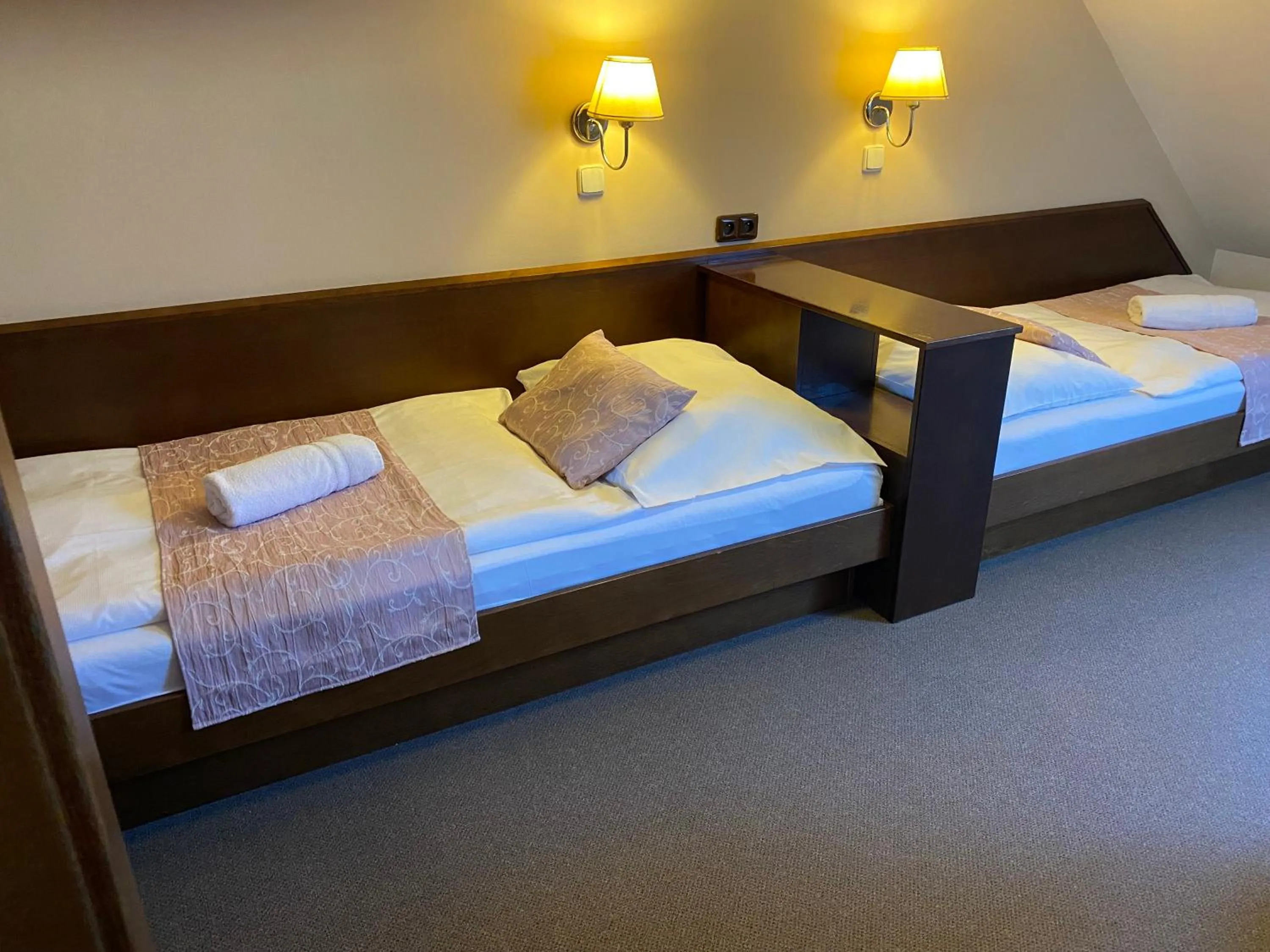 Bed in Zámecký Hotel Zlatý Orel