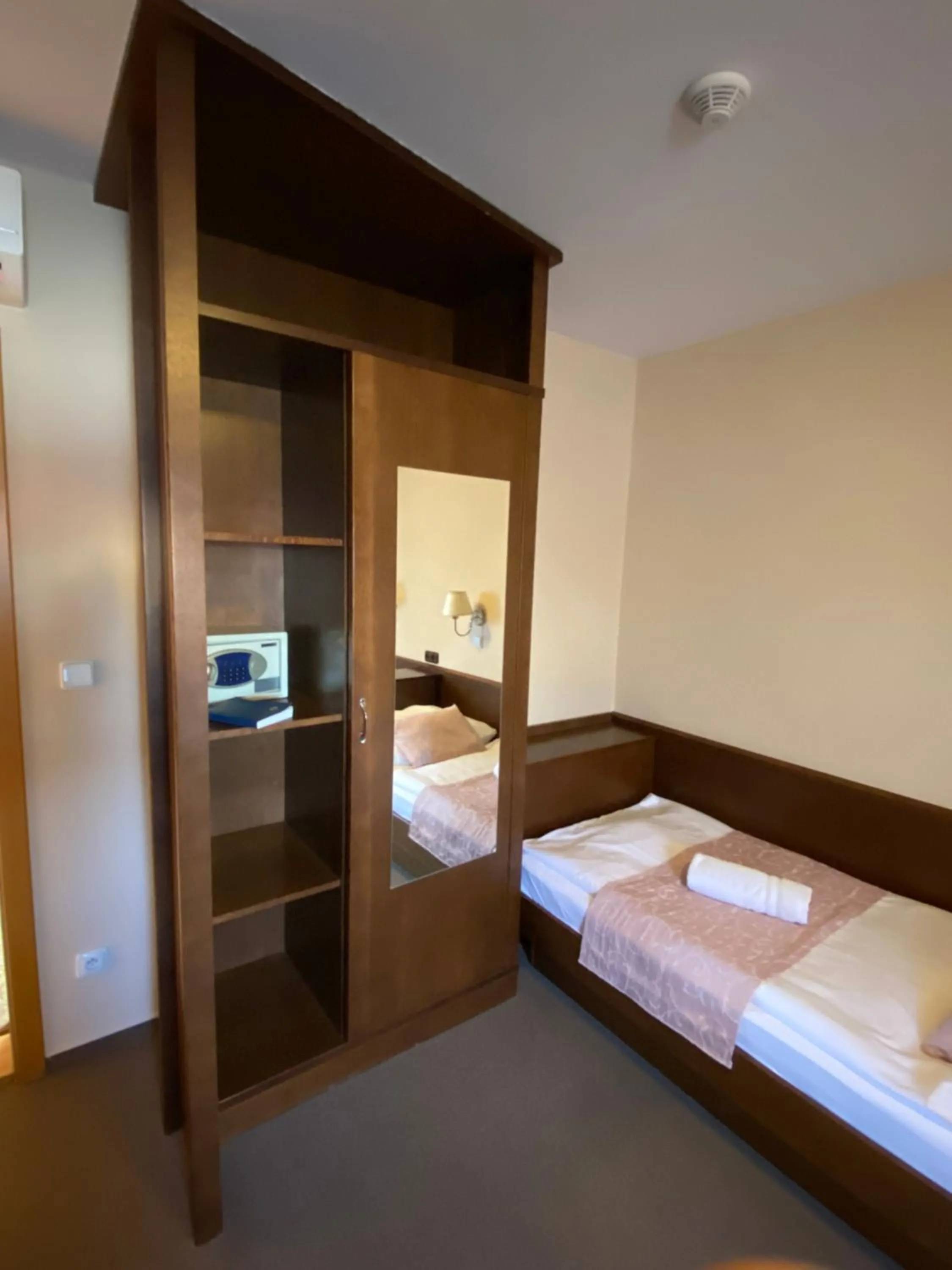 Bed in Zámecký Hotel Zlatý Orel