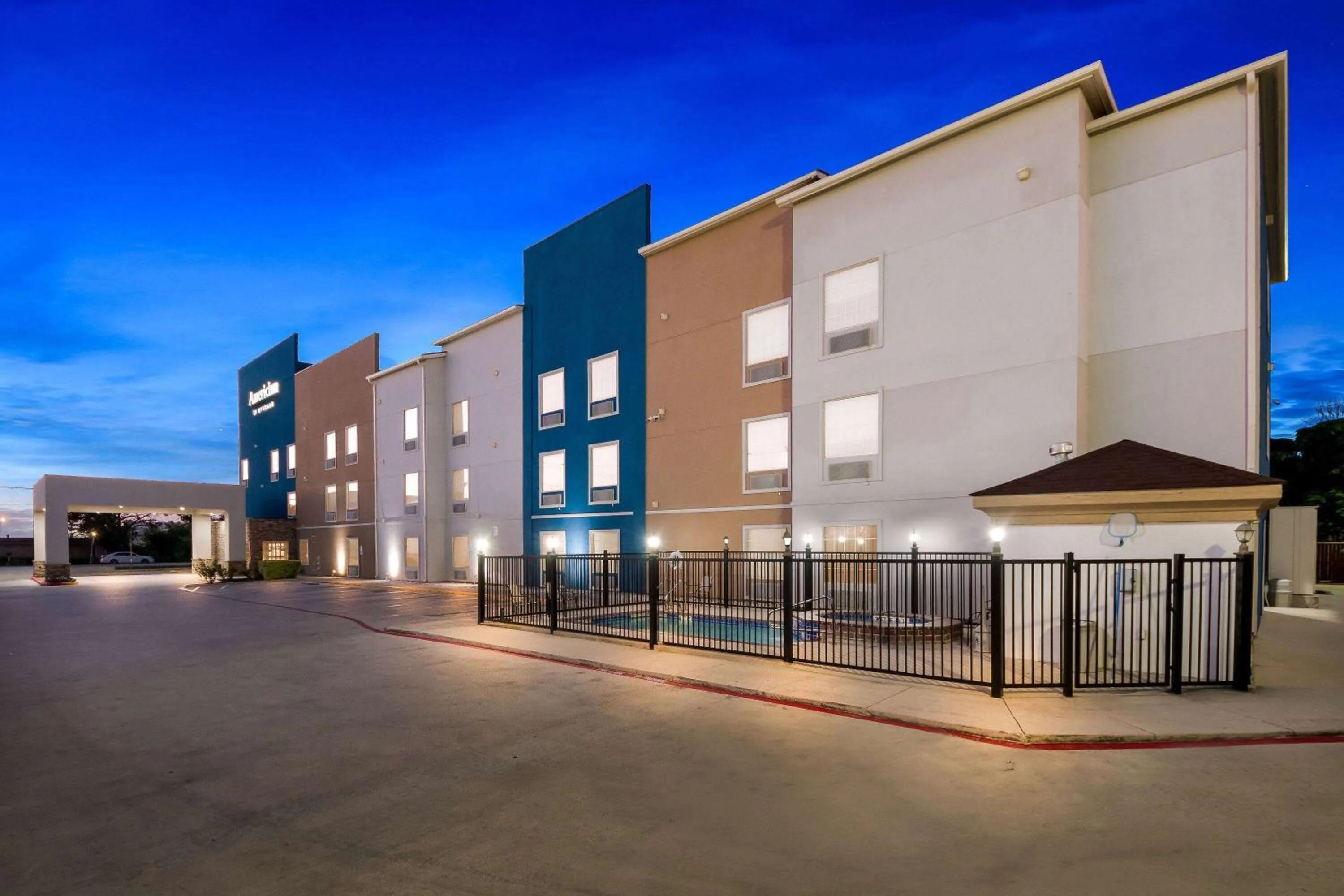 Property building in AmericInn by Wyndham New Braunfels