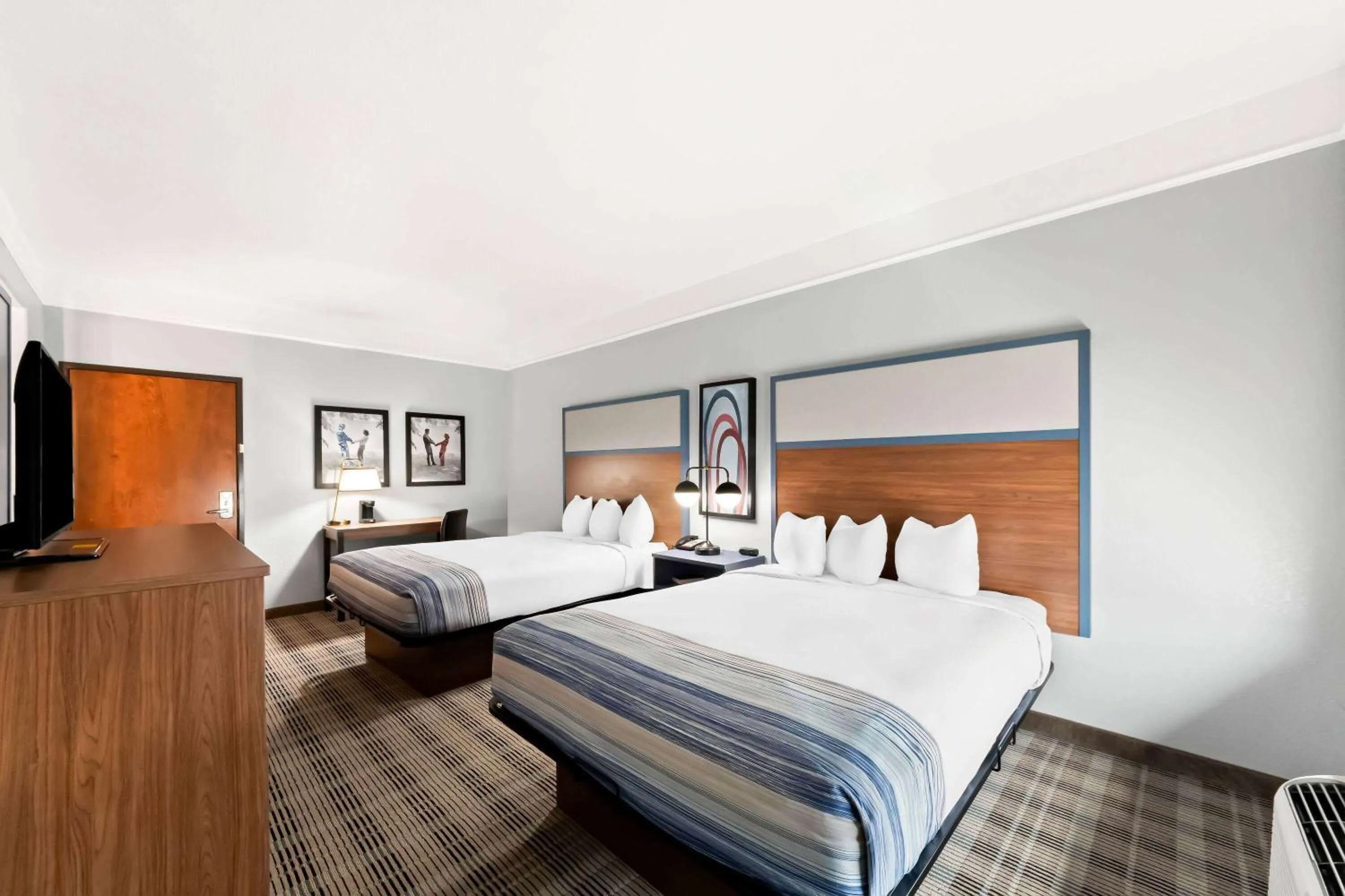 Bed in AmericInn by Wyndham New Braunfels