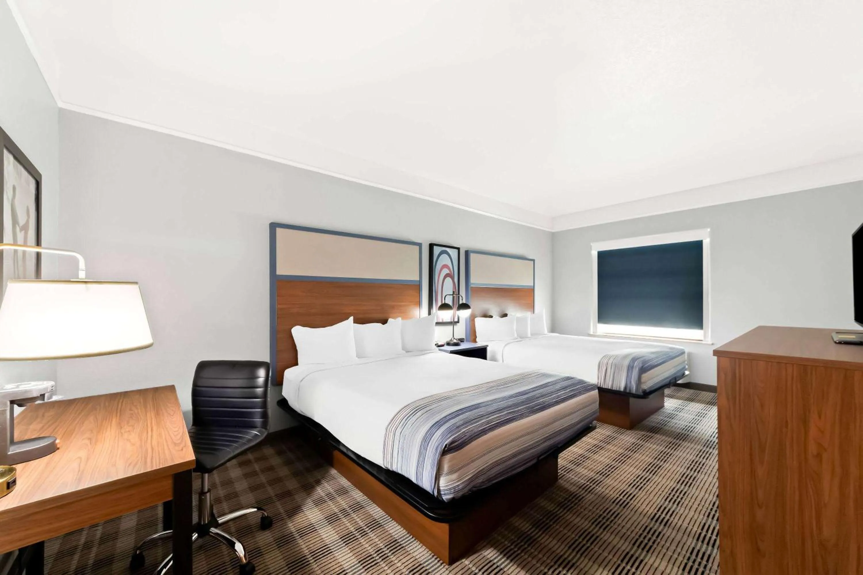 Bed in AmericInn by Wyndham New Braunfels