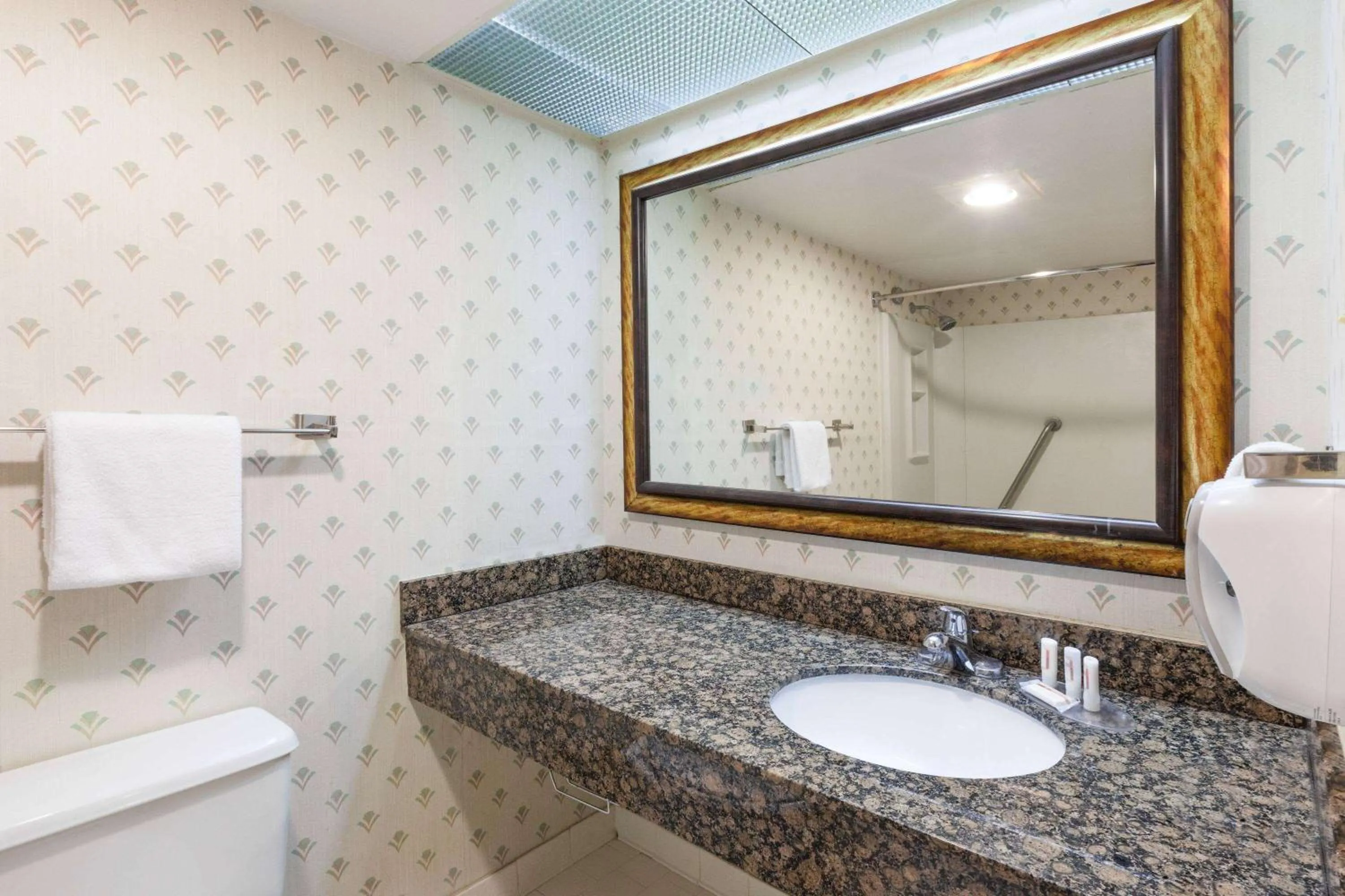 Bathroom in Days Inn by Wyndham Sherman