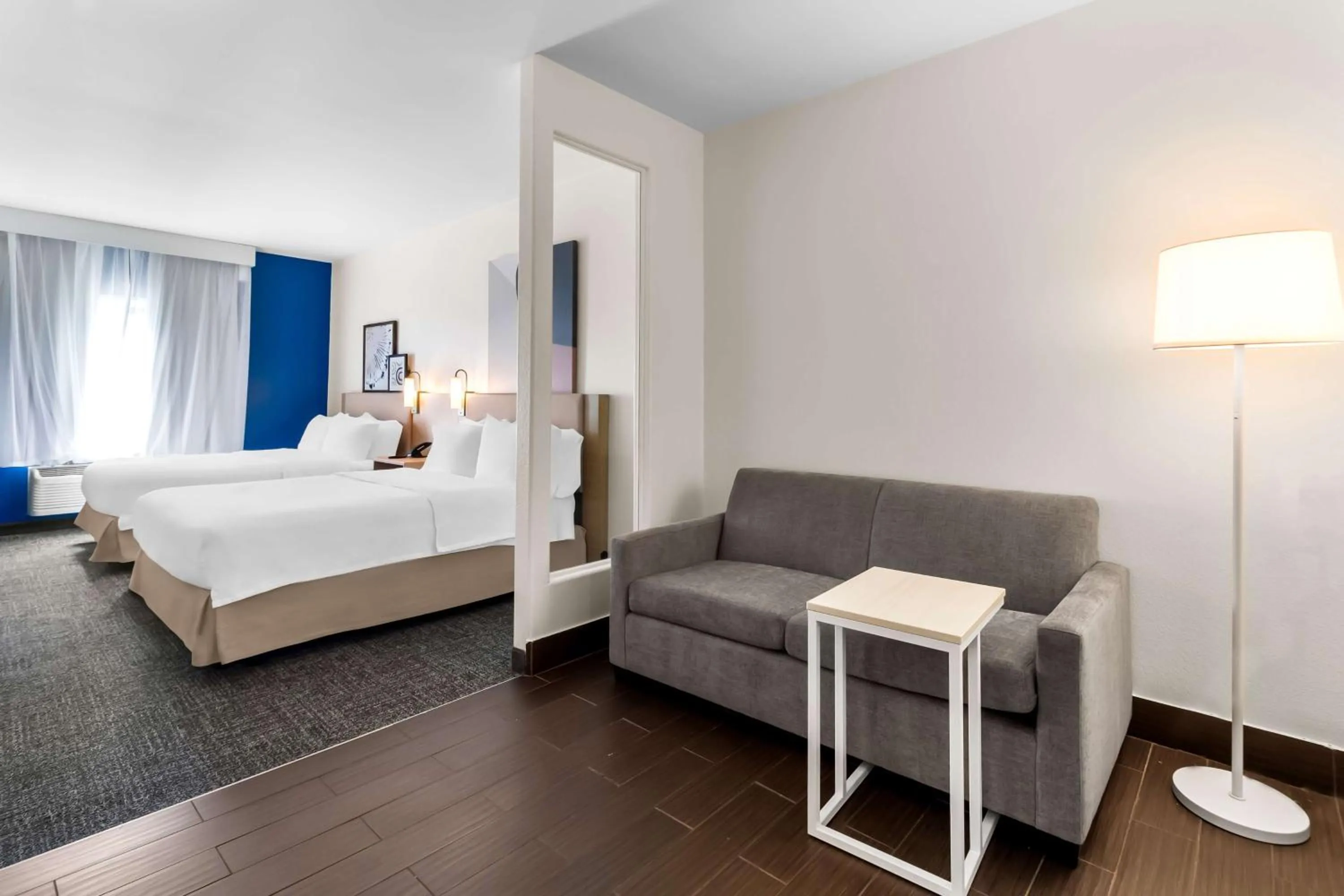 Living room, Bed in Spark by Hilton Pearland