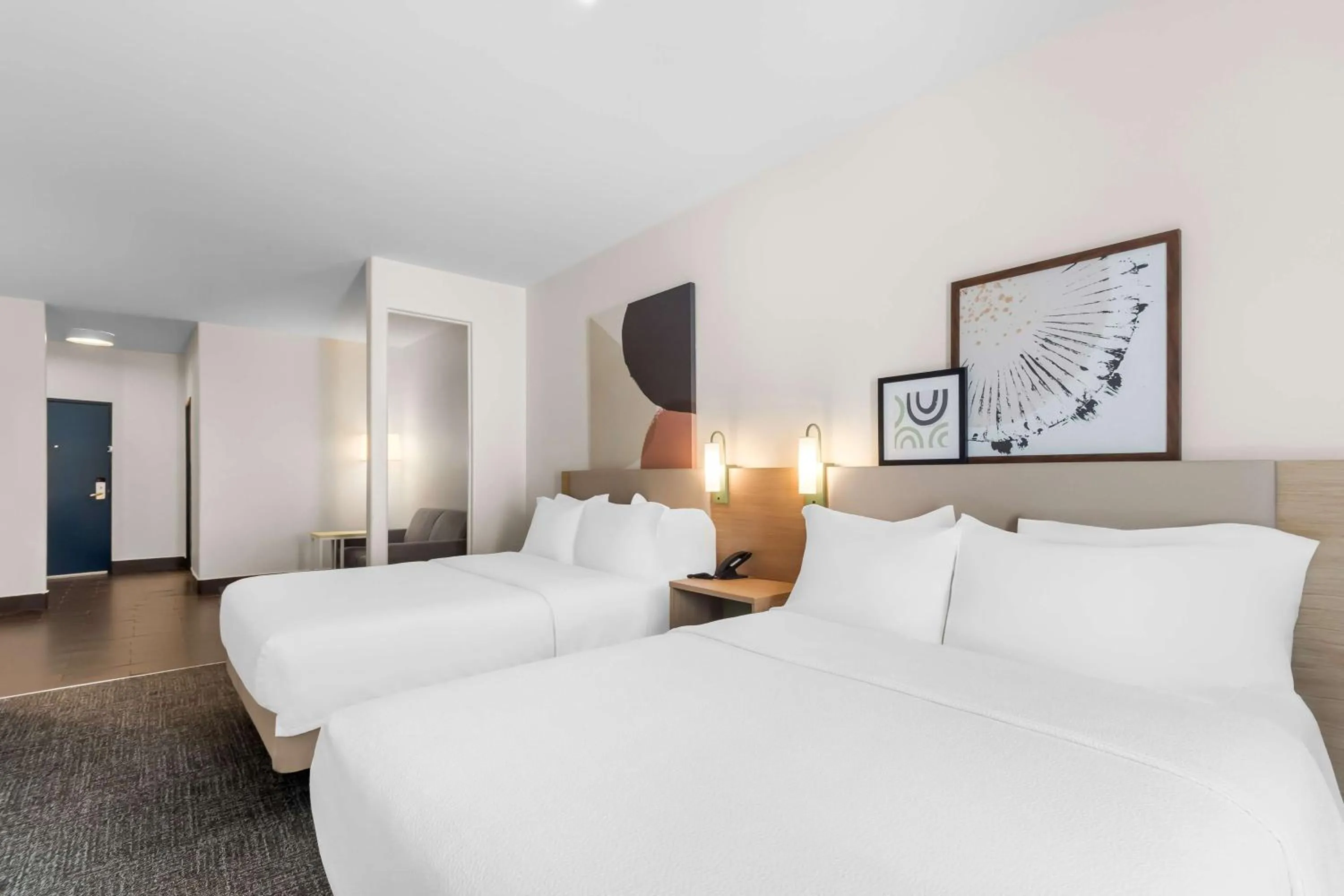 Living room, Bed in Spark by Hilton Pearland