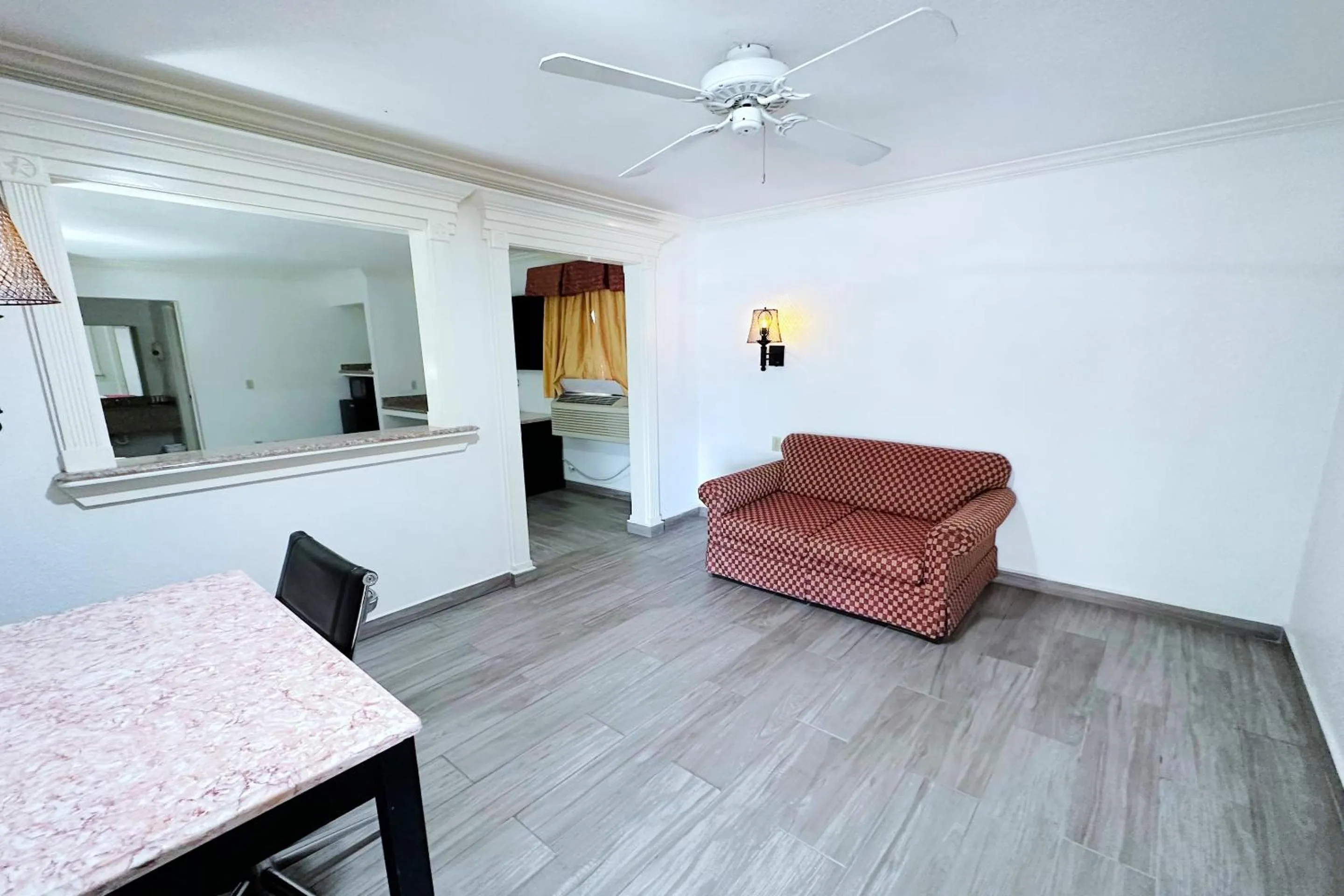 Bedroom in Three Rivers Executive Inn & Suites By OYO