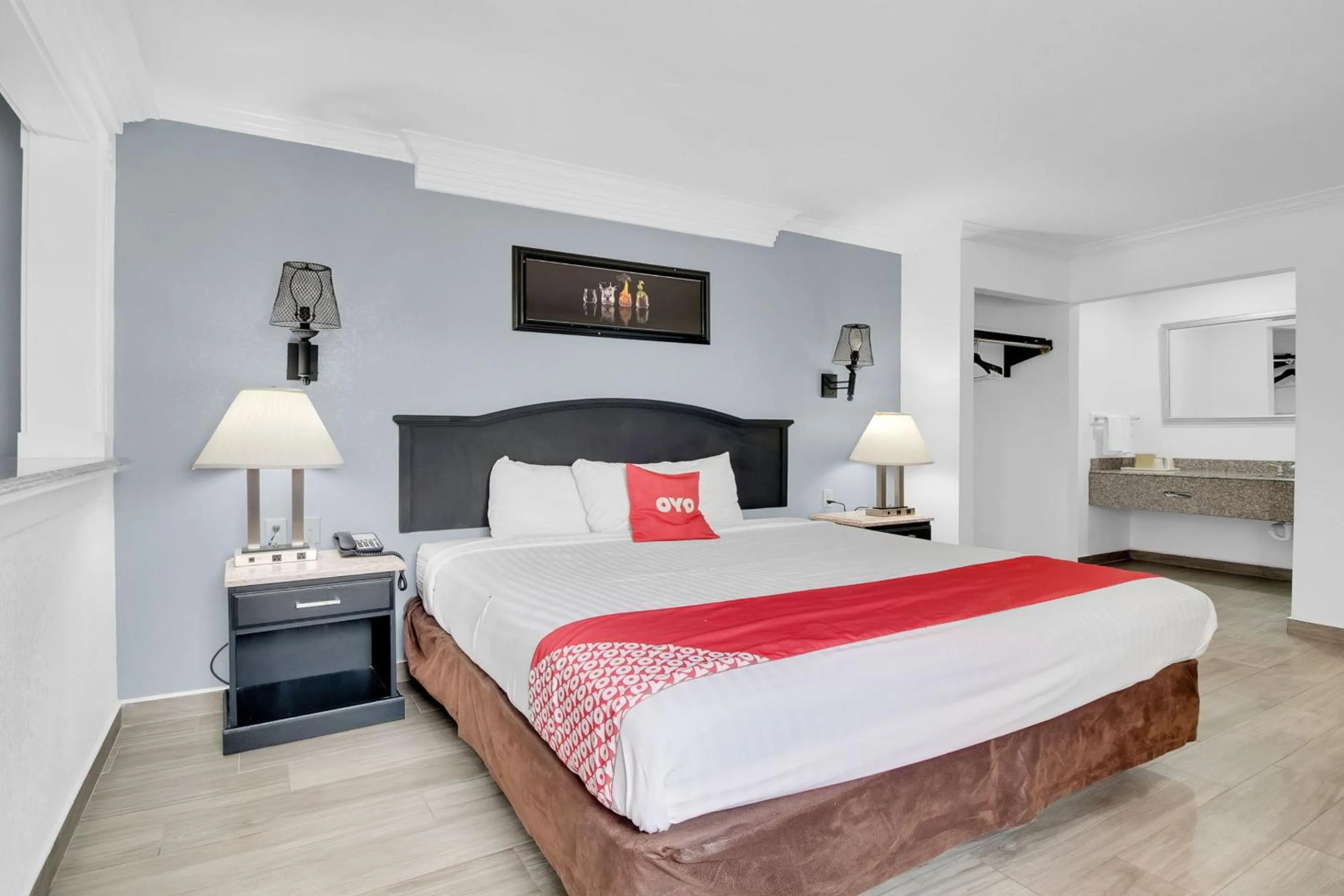 Bedroom, Bed in Three Rivers Executive Inn & Suites By OYO