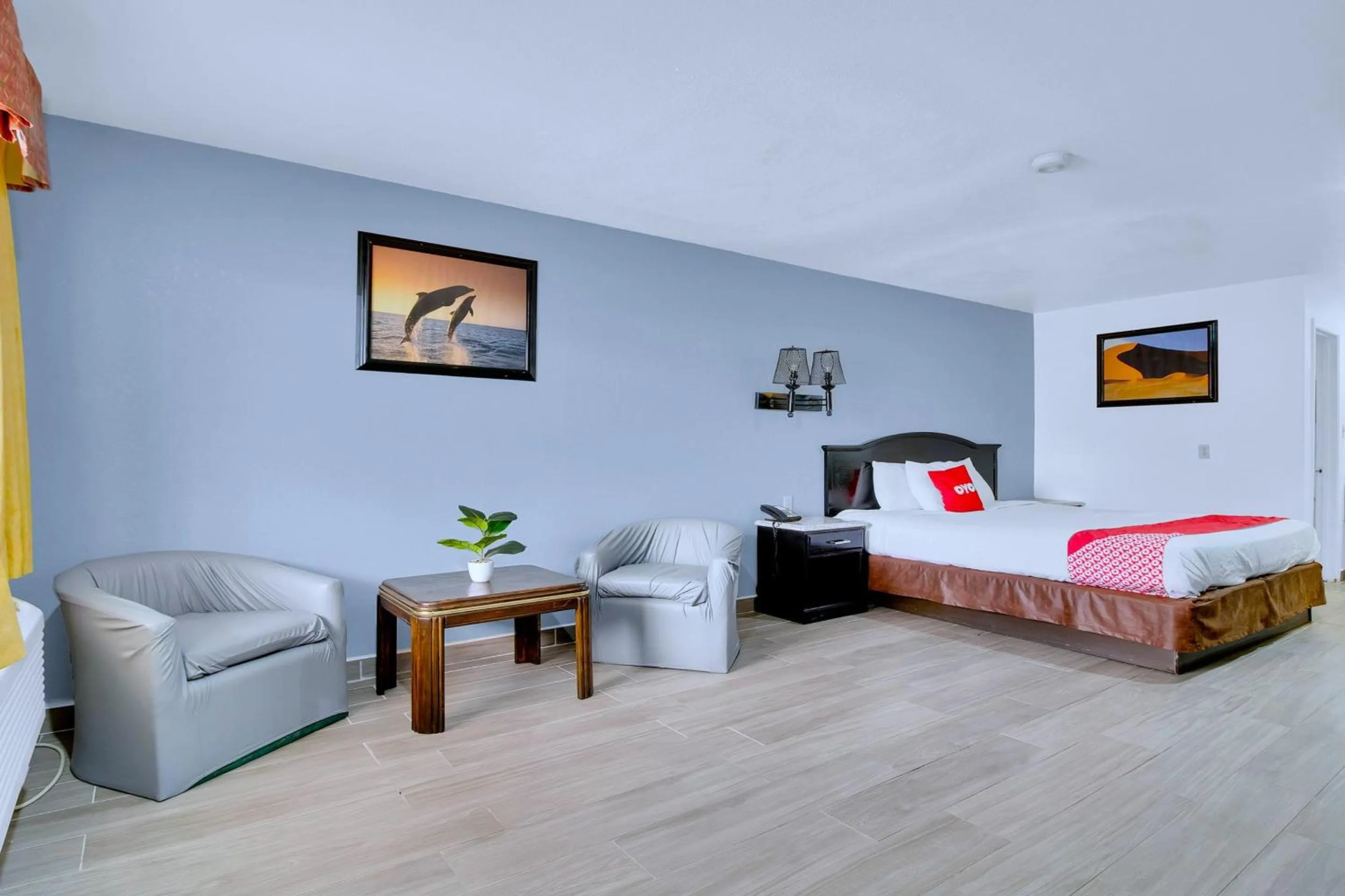 Bedroom, Bed in Three Rivers Executive Inn & Suites By OYO