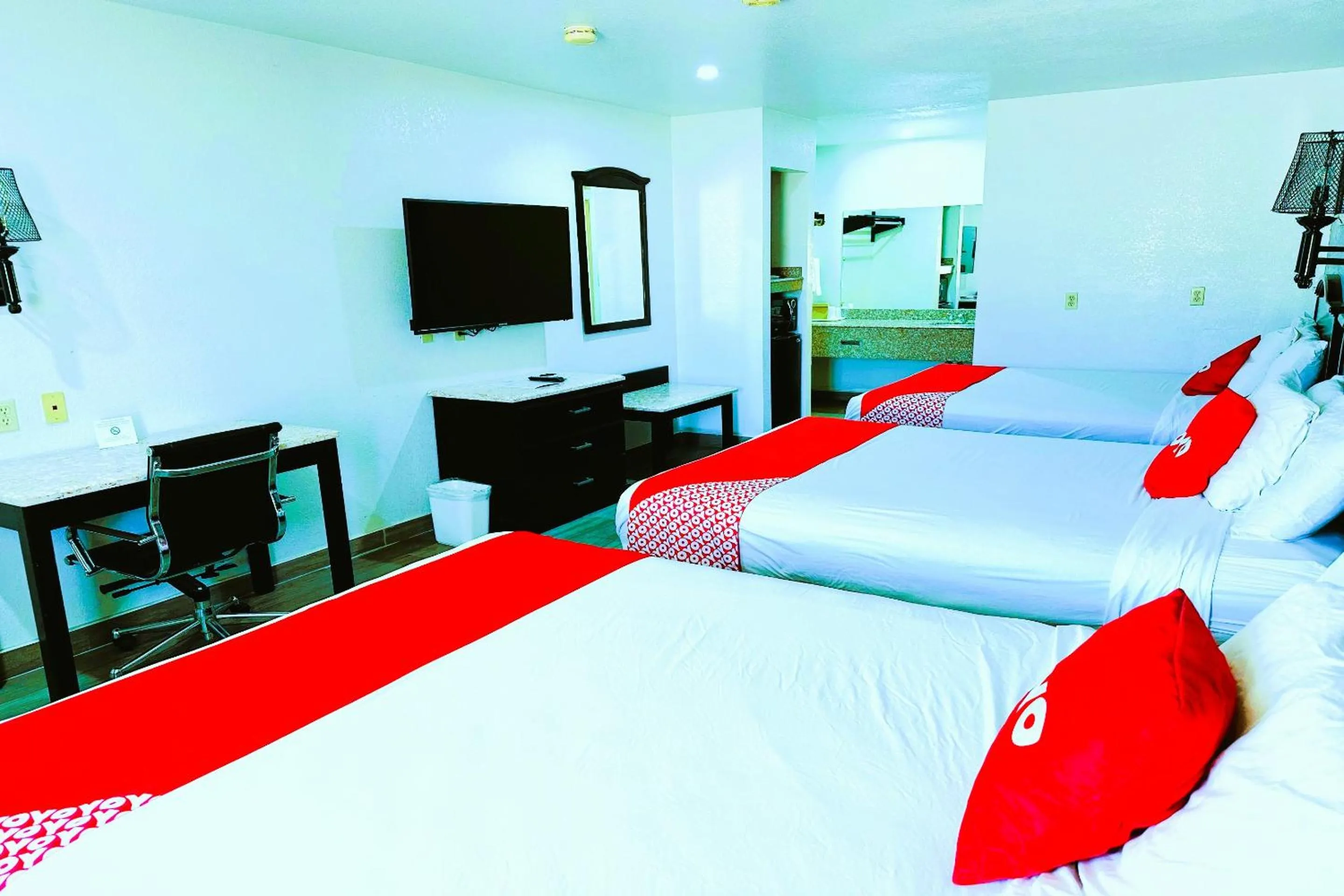 Bedroom, Bed in Three Rivers Executive Inn & Suites By OYO