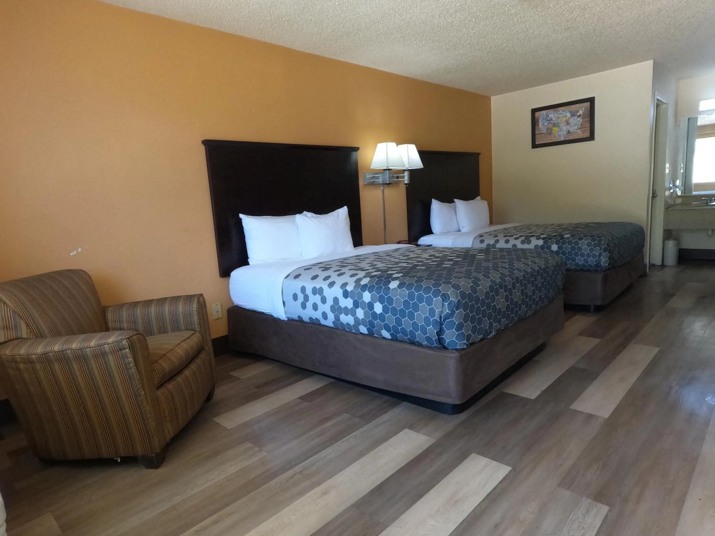 Bed in Econo Lodge Inn & Suites San Antonio near Frost Bank Center