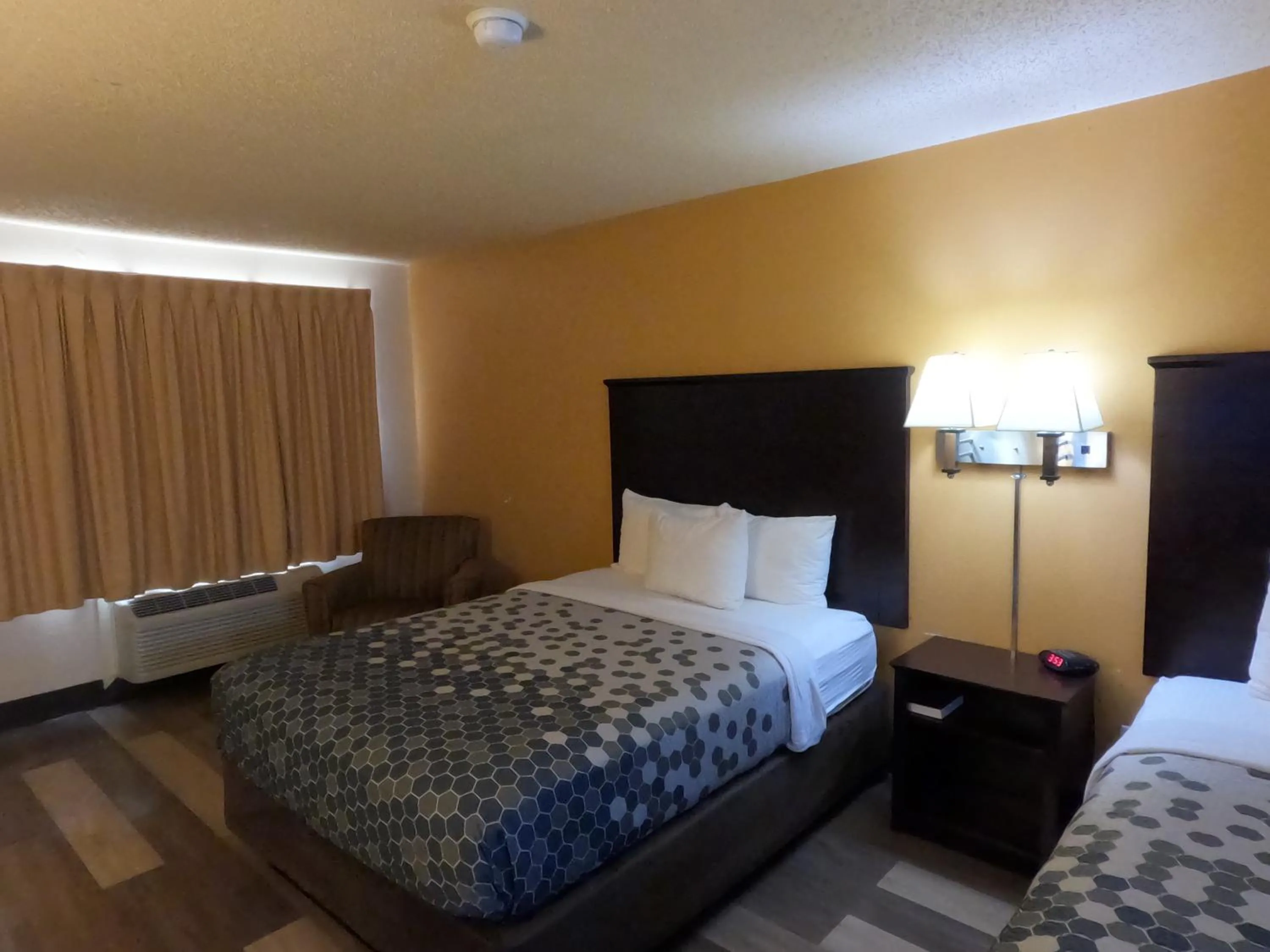 Bed in Econo Lodge Inn & Suites San Antonio near Frost Bank Center