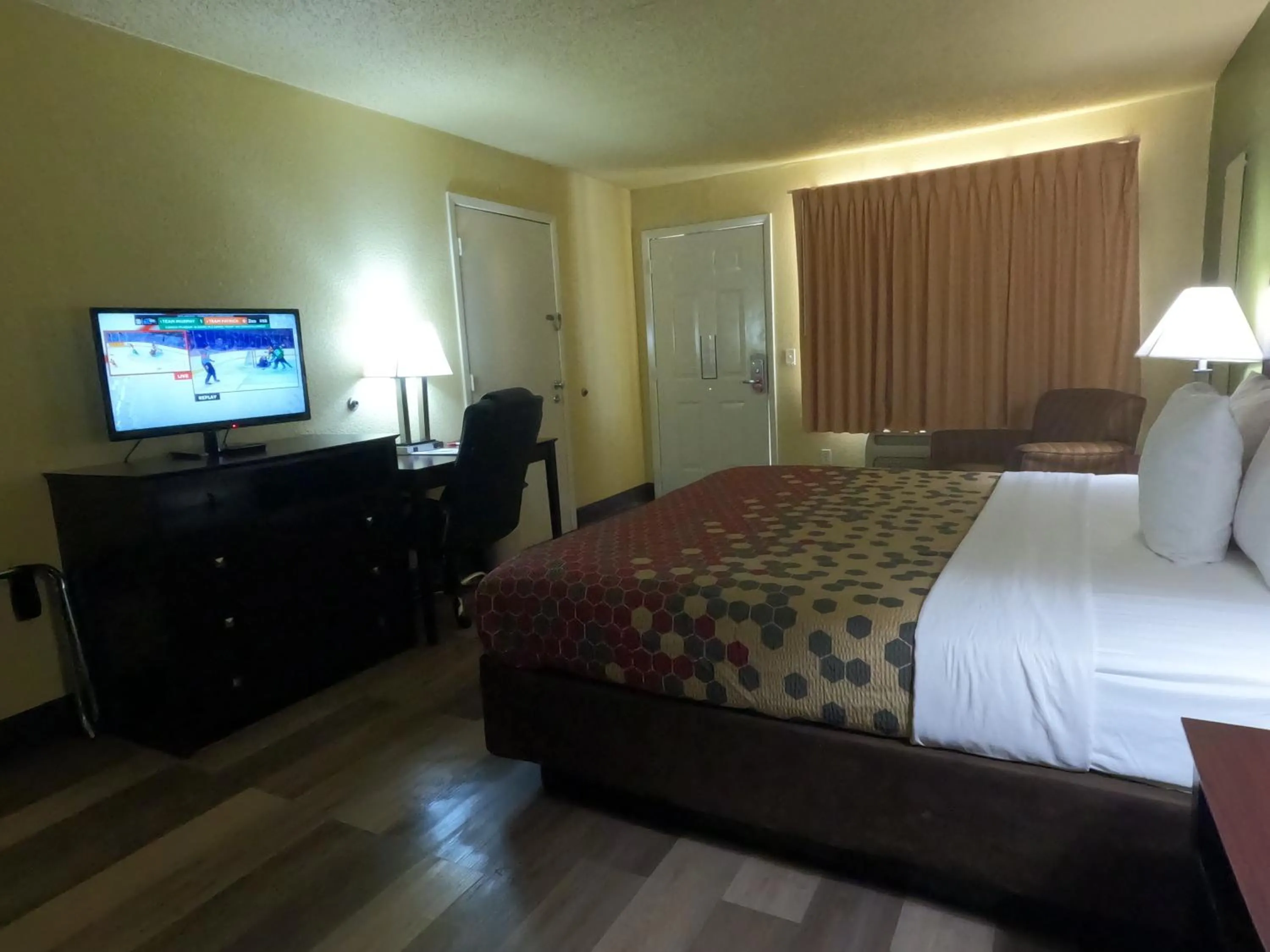 Bed in Econo Lodge Inn & Suites San Antonio near Frost Bank Center