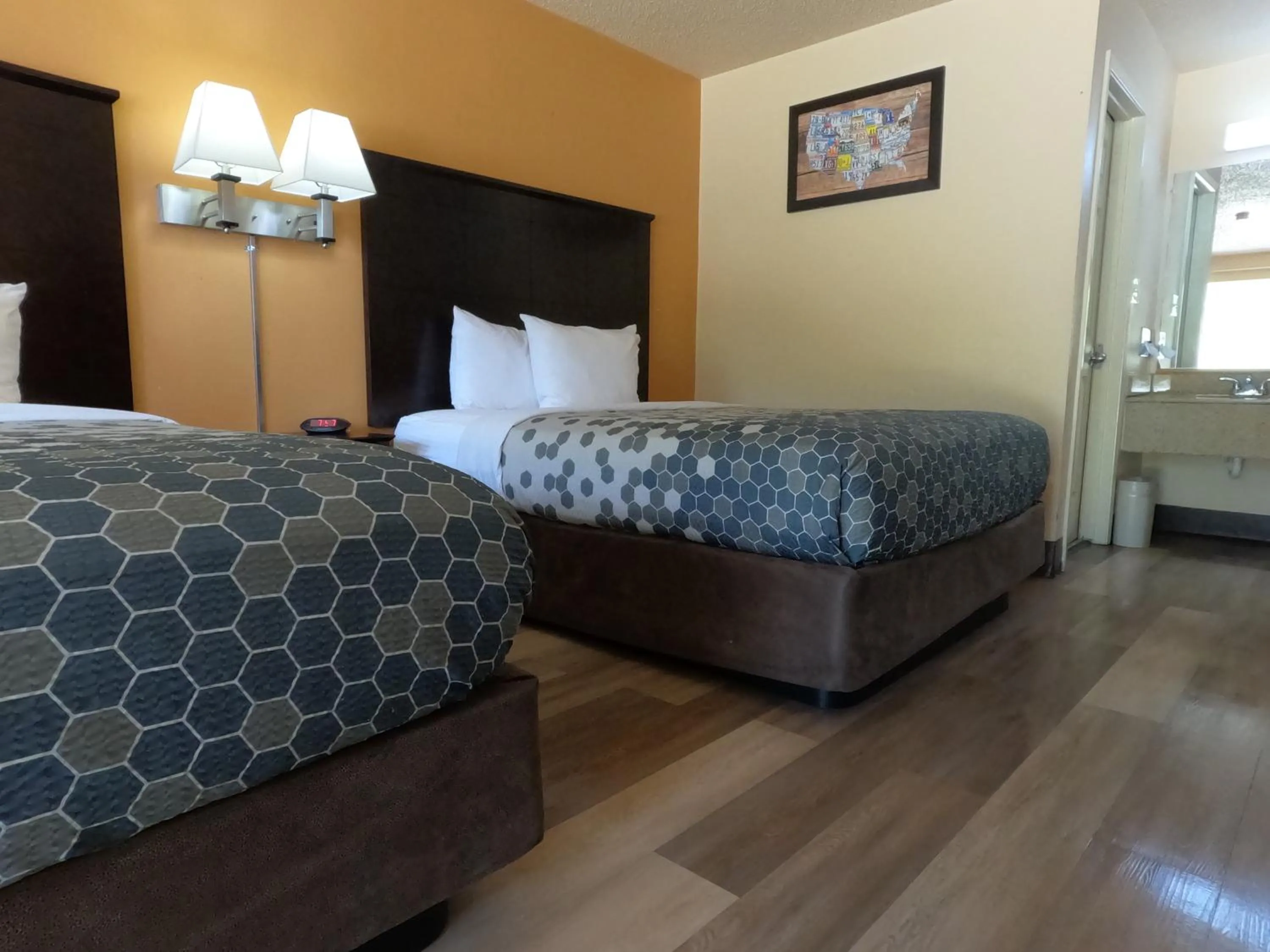 Bed in Econo Lodge Inn & Suites San Antonio near Frost Bank Center