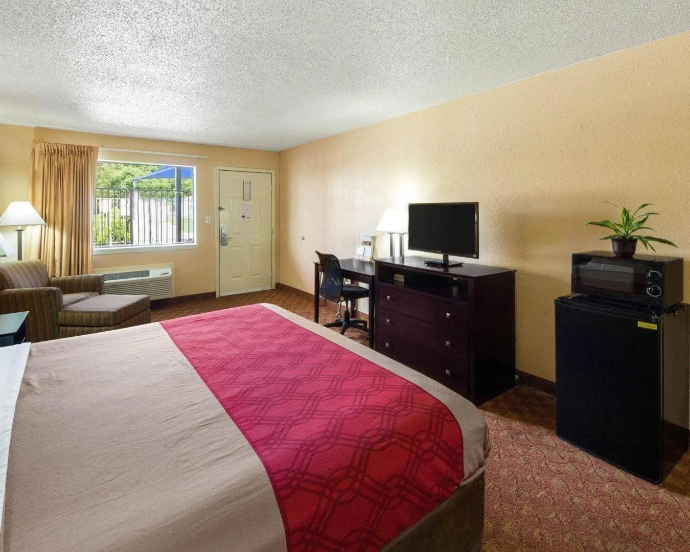Bedroom, Bed in Econo Lodge Inn & Suites San Antonio near Frost Bank Center