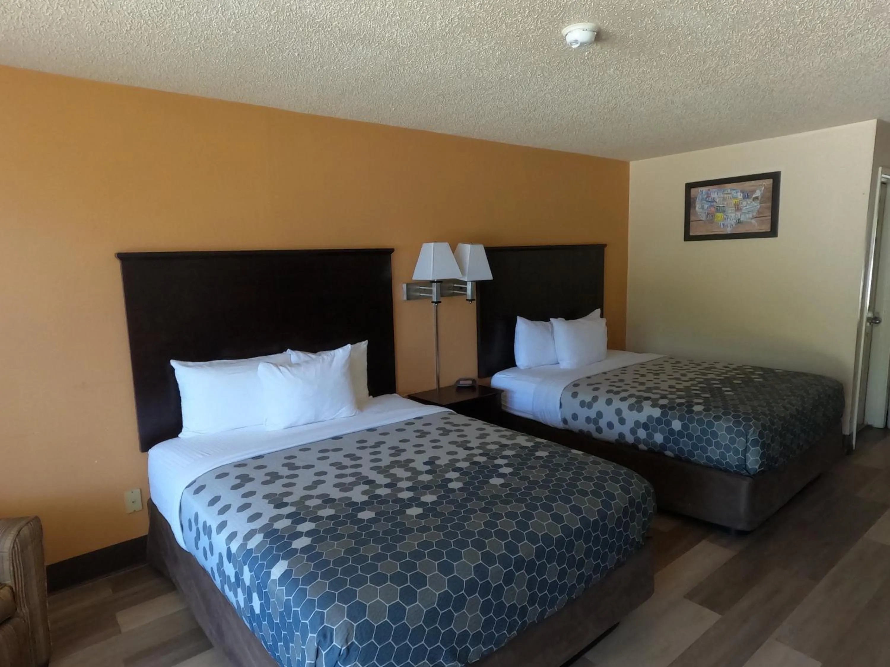 Bed in Econo Lodge Inn & Suites San Antonio near Frost Bank Center