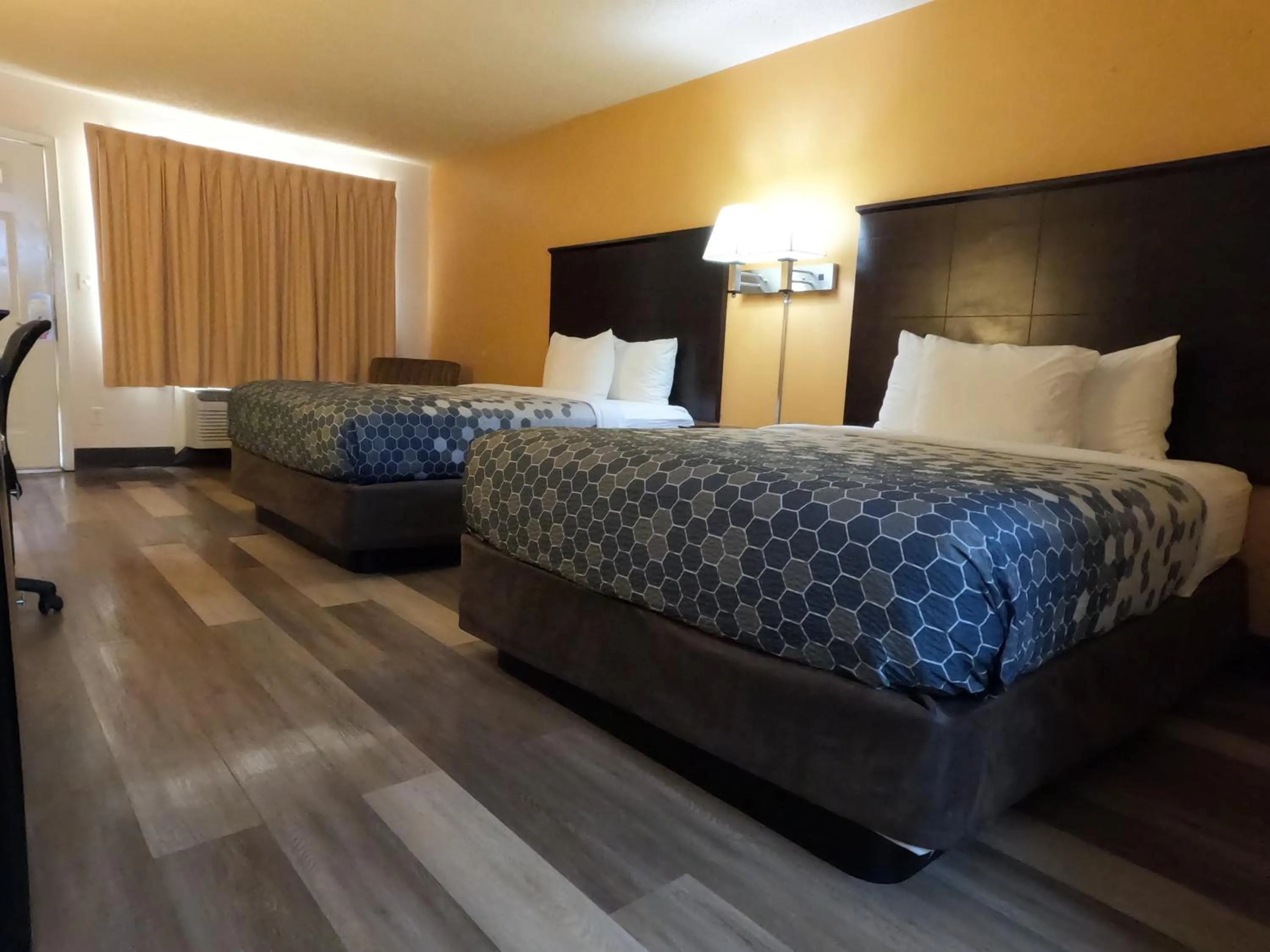 Bed in Econo Lodge Inn & Suites San Antonio near Frost Bank Center