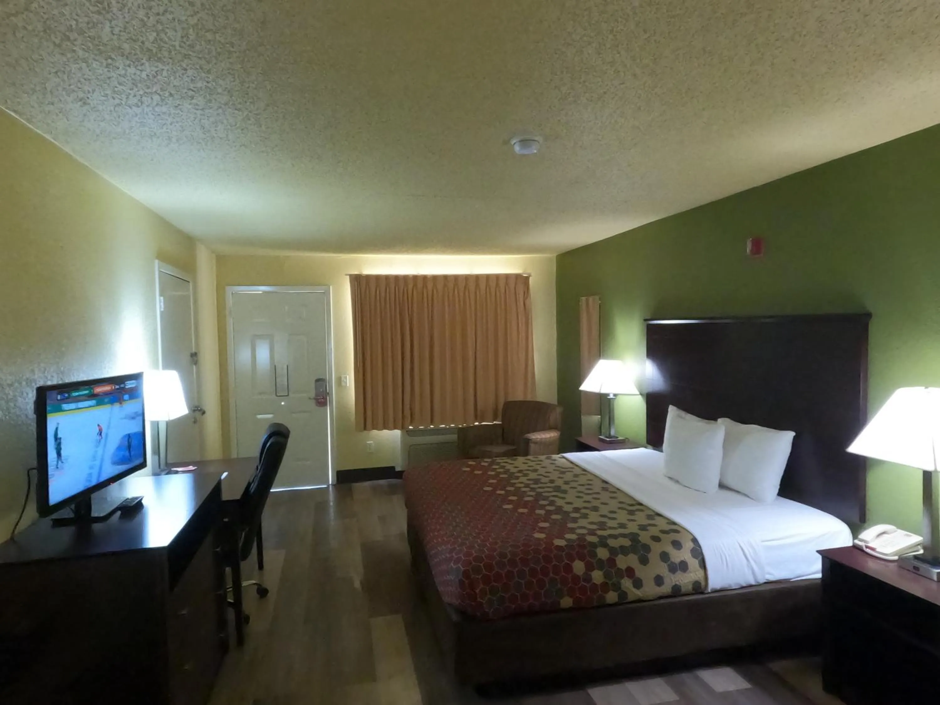 Bed in Econo Lodge Inn & Suites San Antonio near Frost Bank Center