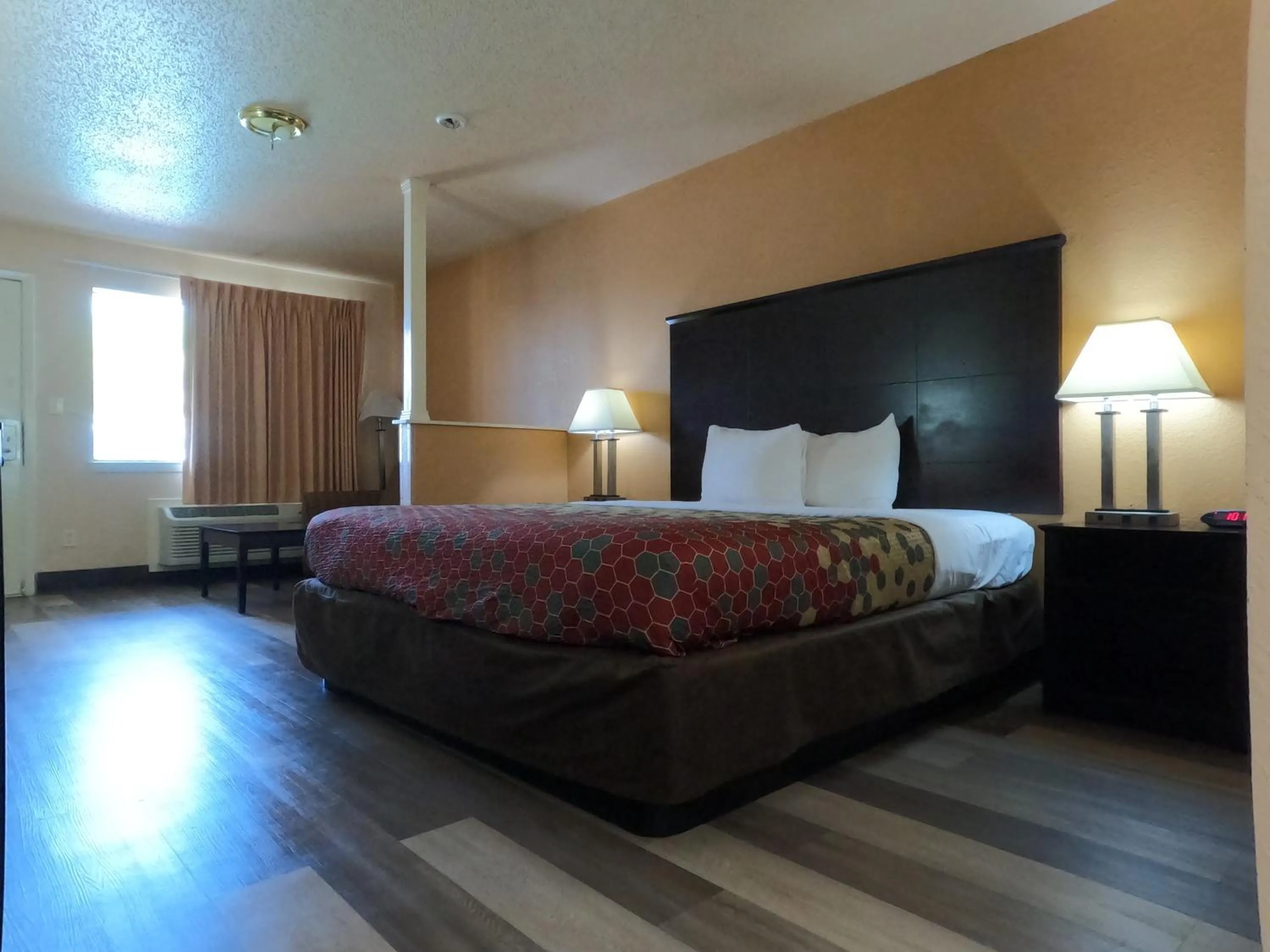 Bed in Econo Lodge Inn & Suites San Antonio near Frost Bank Center