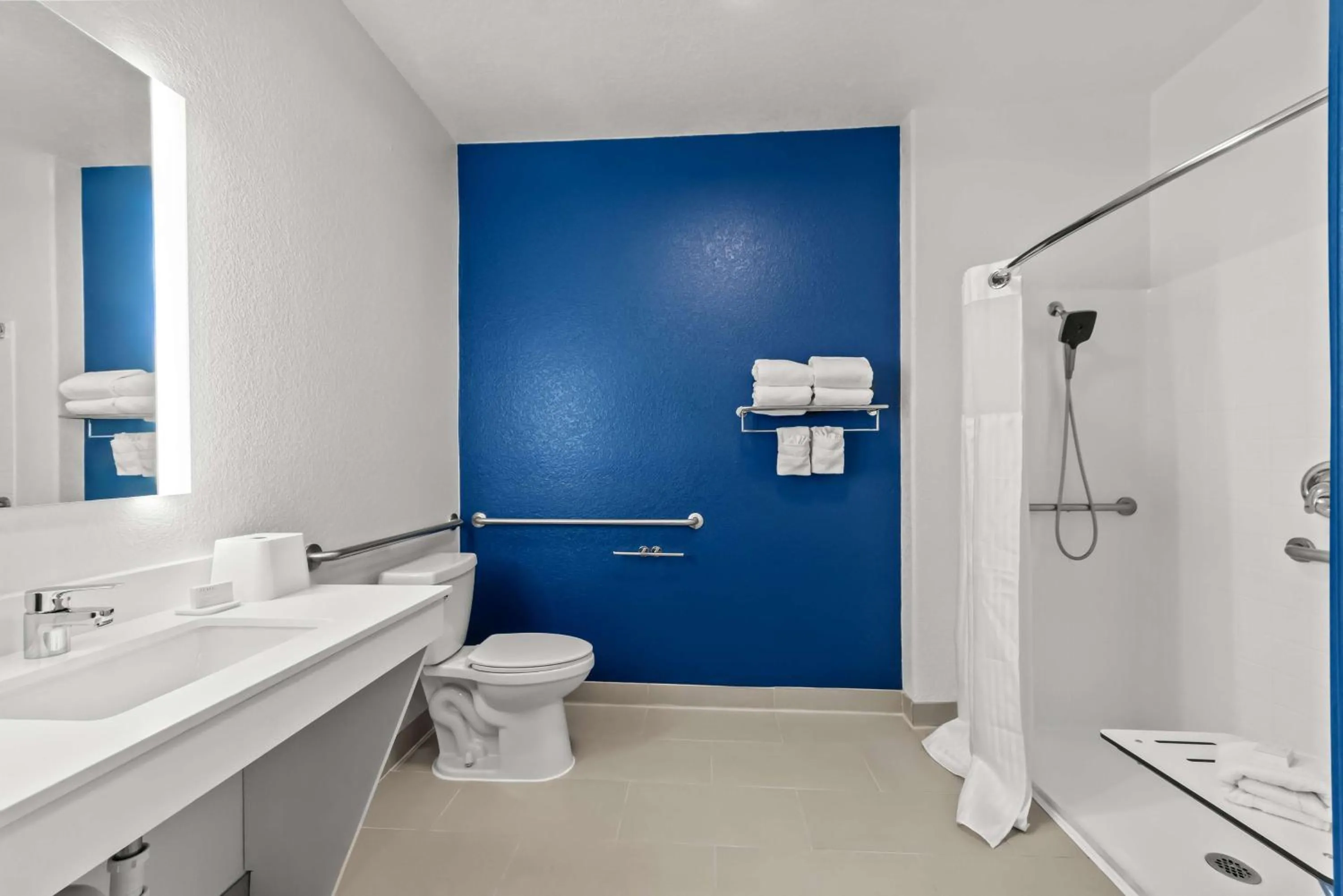 Bathroom in Spark by Hilton Selma