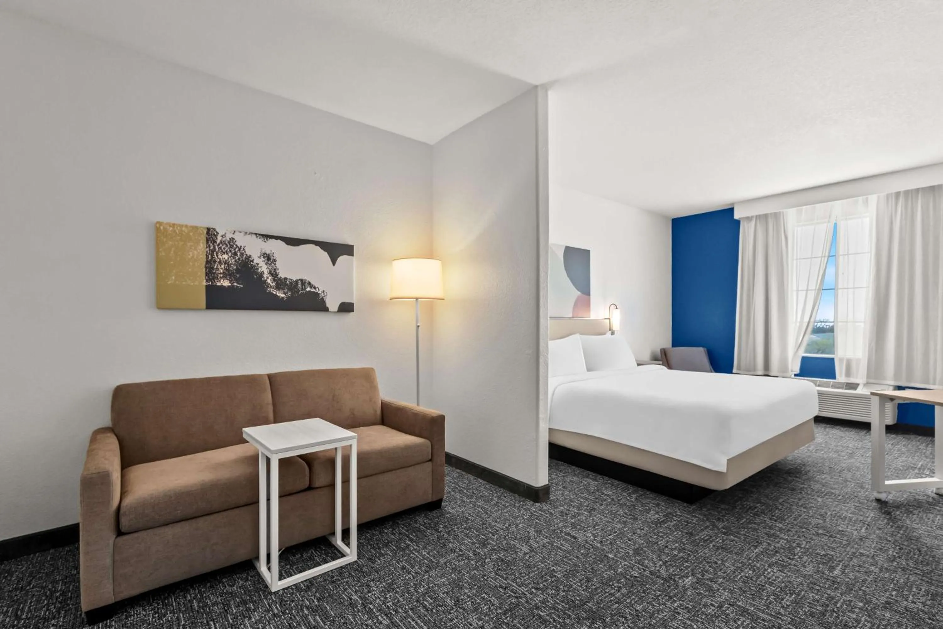 Living room, Bed in Spark by Hilton Selma