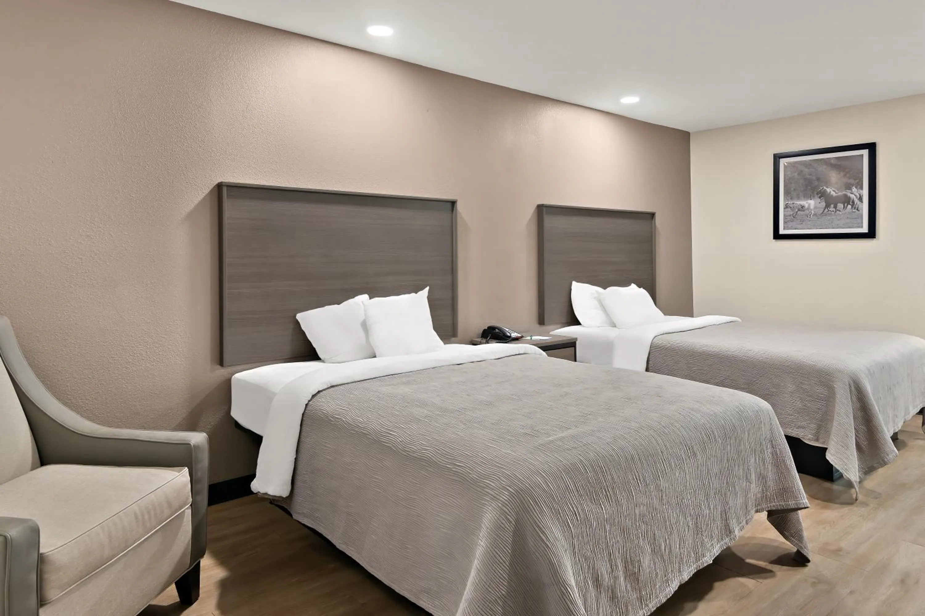 Bed in Quality Inn & Suites Weatherford