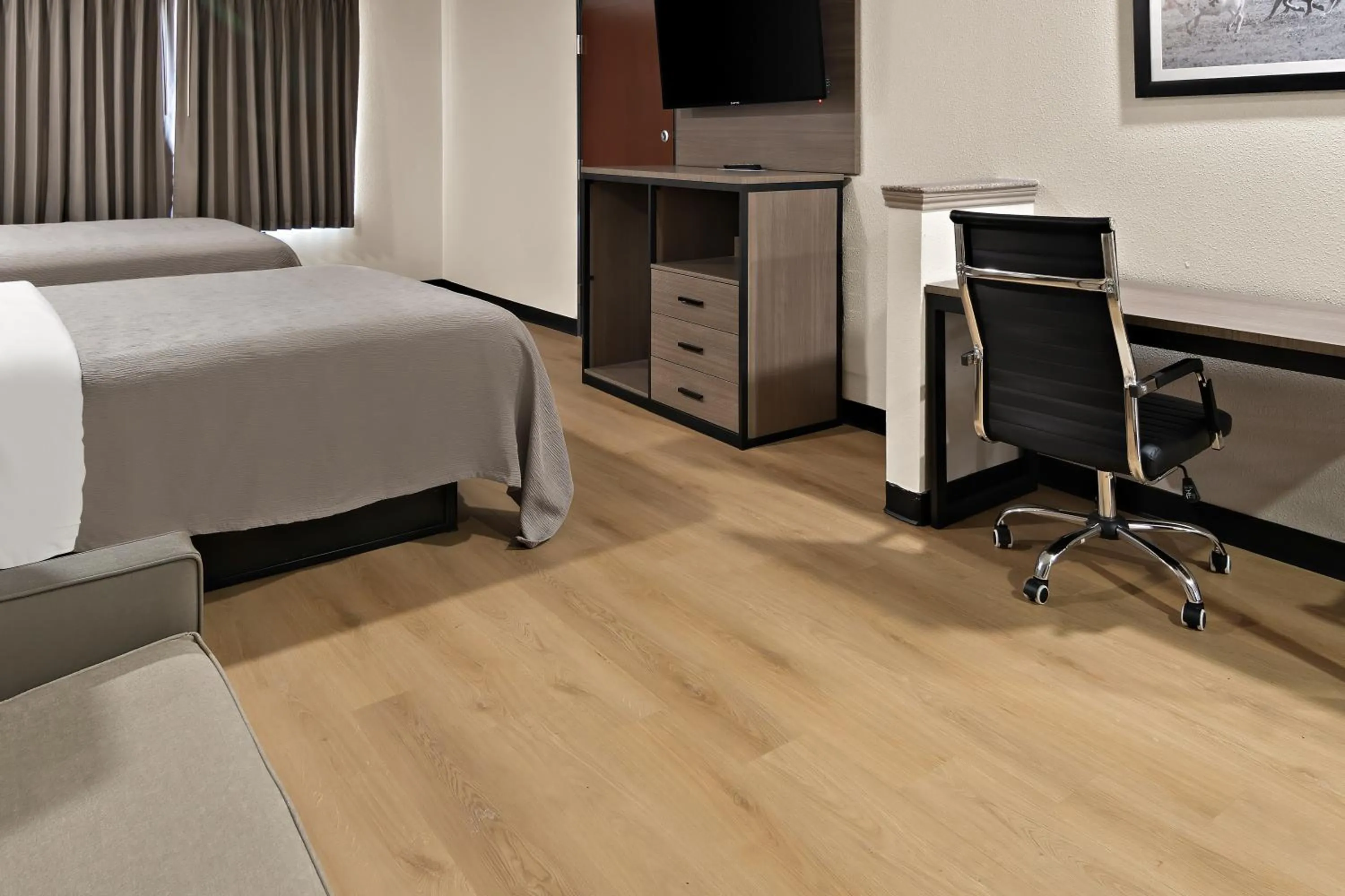 Bed in Quality Inn & Suites Weatherford