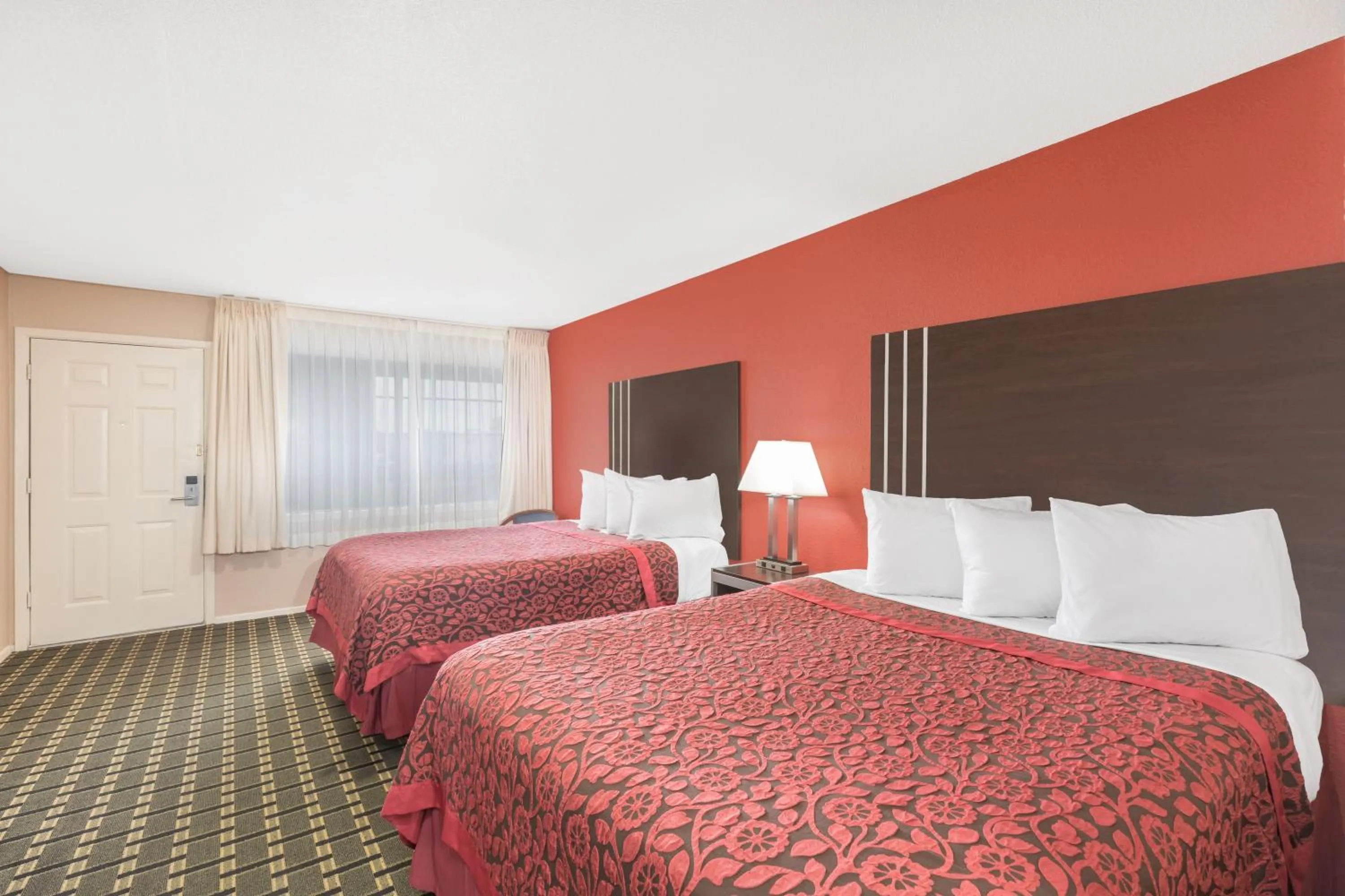 Living room, Bed in Days Inn by Wyndham College Station University Drive